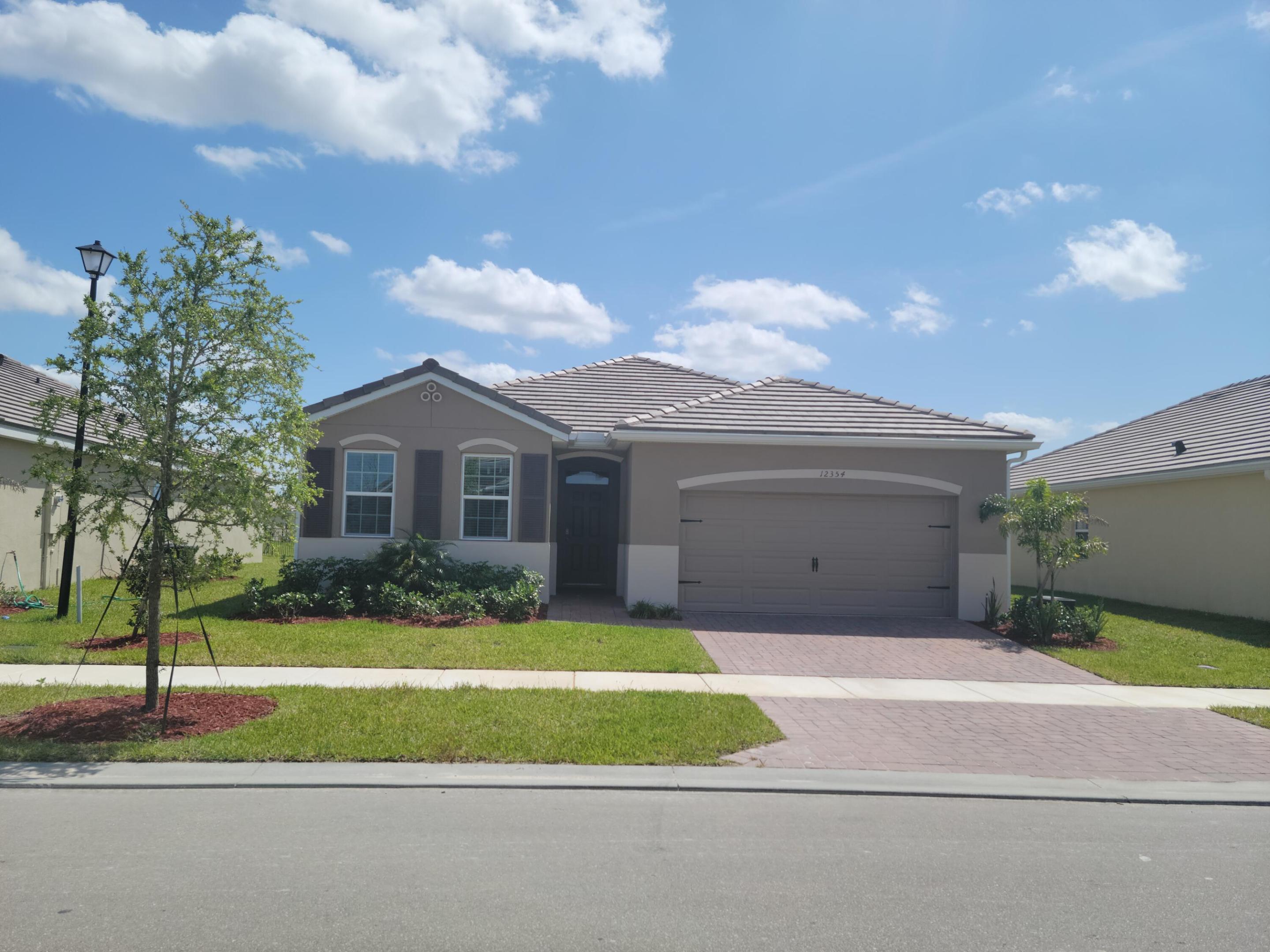 Welcome to this stunning 4-bedroom, 2-bathroom home located in the highly sought-after Preserve at Tradition community. Enjoy the best of Port St. Lucie living with nearby shopping, parks, top-rated schools, restaurants, and medical facilities all just minutes away. Home Features: Spacious, open-concept living areas, modern kitchen with updated appliances, full lawn maintenance, basic cable, and high-speed internet included  Community Perks: Quiet, well-maintained neighborhood Close to I-95 for easy commuting Minutes from Clover Park - home of the New York Mets spring training This is a perfect place to call home in one of the most desirable areas of Port St. Lucie. Schedule a tour today!