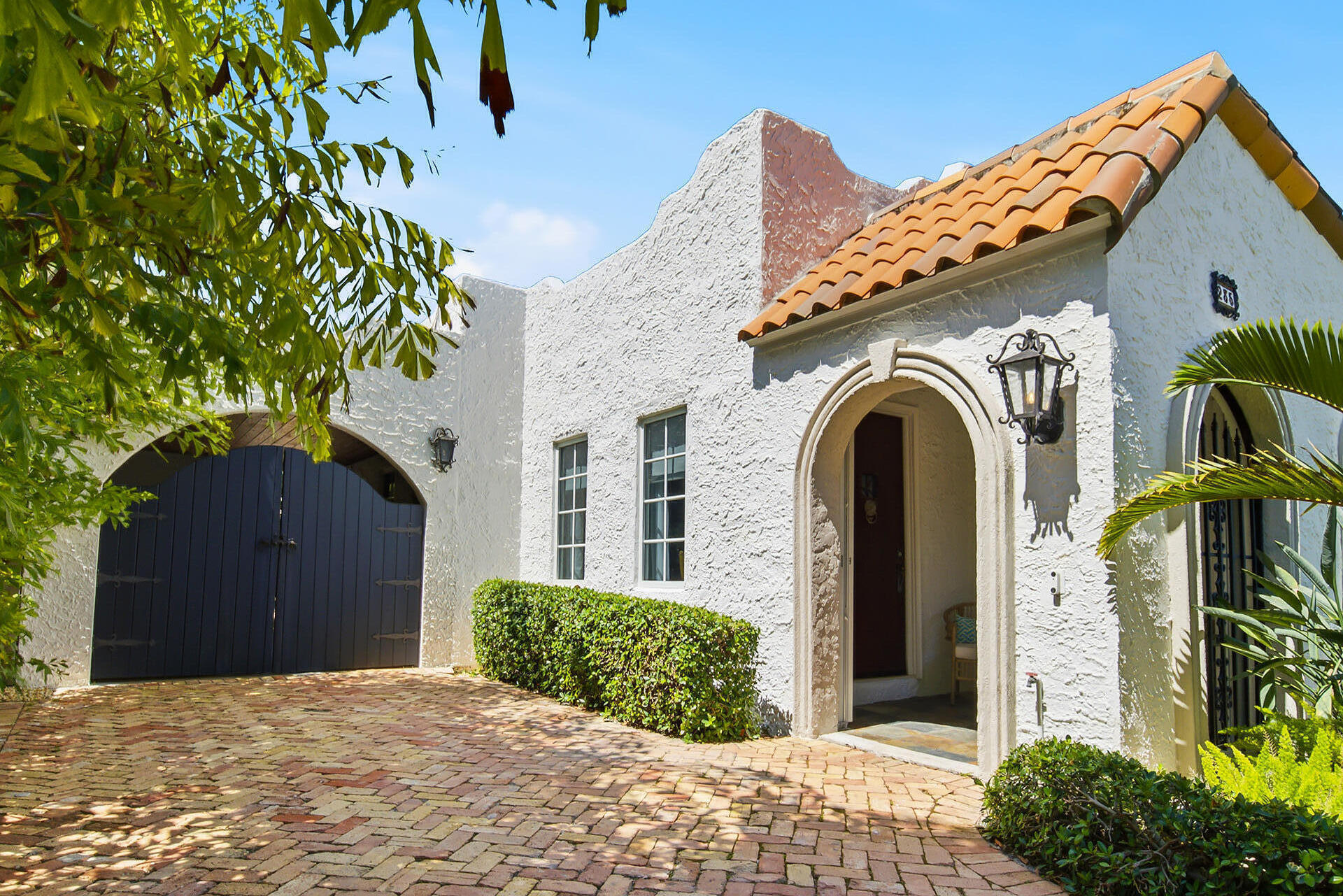 A "South of Southern" Charmer. This quintessential Palm Beach 1920's Mediterranean classic is a beautiful blend of historic details and modern conveniences.  The tropical back yard with fountain and pool completes this perfect Pied-a-Terre  lifestyle. Furnishings optional. Conveniently, located near Palm Beach, Downtown West Palm, and PBI.