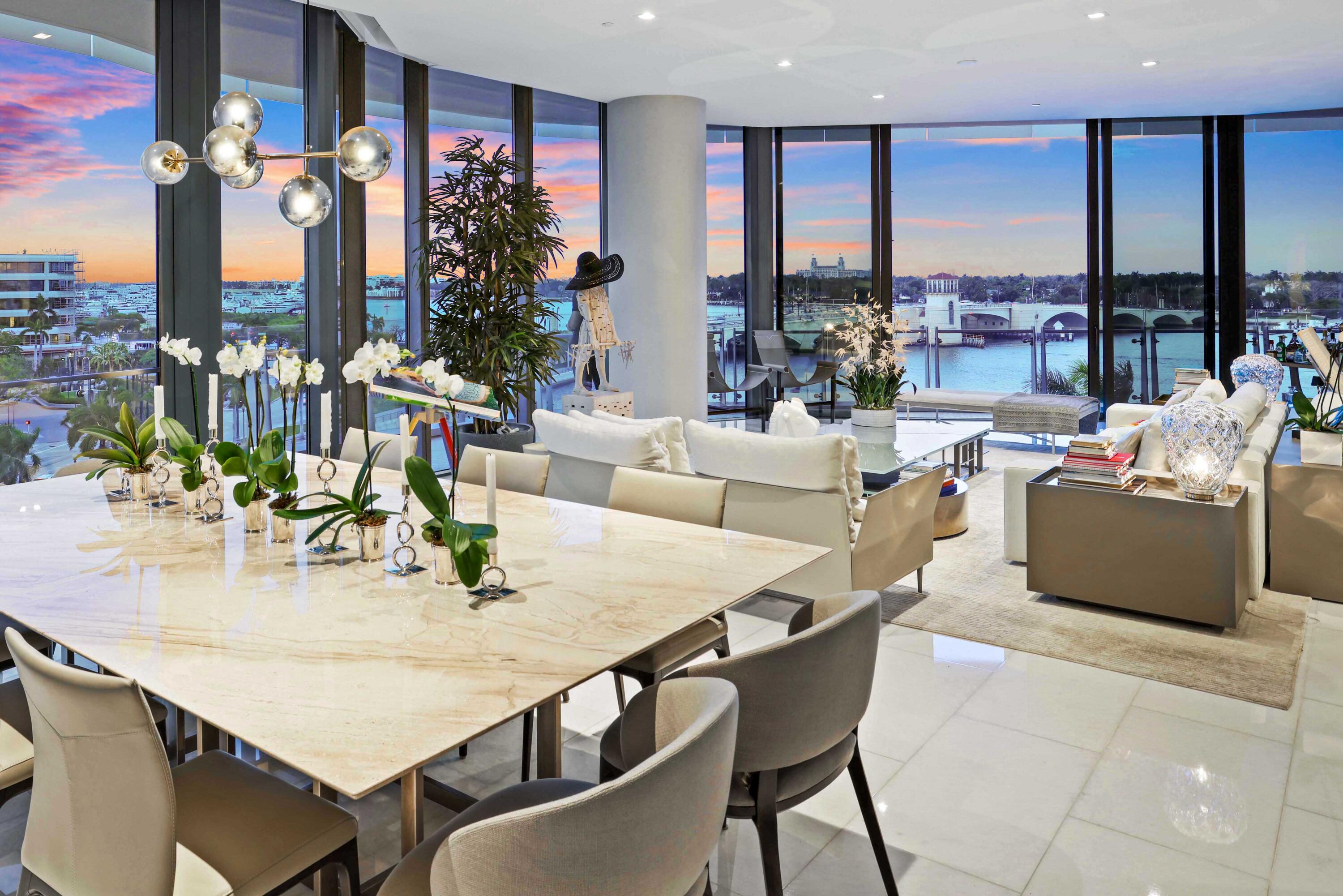 Chic Contemporary Turnkey Corner Residence at The Bristol. This flawless, fully furnished home by Artefacto offers 4 bedrooms, a waterfront office/den, and 5.1 bathrooms, with sweeping views of the Intracoastal Waterway, Palm Beach Marina, and city skyline--seamlessly blending a sophisticated aesthetic with the tranquility of waterfront living. Spanning 5,838 total square feet (4,483 interior), the thoughtfully designed layout features expansive living spaces and wraparound terraces with multiple exposures. Floor-to-ceiling 11-foot impact glass doors and windows fill the residence with natural light, complemented by motorized sun and blackout shades. The primary suite is a private retreat with dual spa-like bathrooms and two oversized custom dressing rooms. The adjacent waterfront office/den offers flexibility for work or relaxation. A state-of-the-art kitchen is outfitted with top-of-the-line Gaggenau appliances, including a gas range, induction cooktop, double ovens, two dishwashers, and a wine refrigerator. The Bristol offers a truly exceptional lifestyle, including the most impressive 5-star amenities and special attention to detail including on-site professional concierge, two spas, a cold plunge, beauty salon, waterfront fitness center, 75-ft swimming pool, club lounge, and indoor/outdoor dog park (pet friendly). Three house vehicles equipped with a driver, gated entrance, valet and front desk both available 24-hours. Just moments from Palm Beach Island, the world-renowned Worth Avenue, premier private aviation, Palm Beach International Airport, and the exclusive Palm Beach Marina. This is not just a home, it is a lifestyle and a statement of sophistication and prestige.