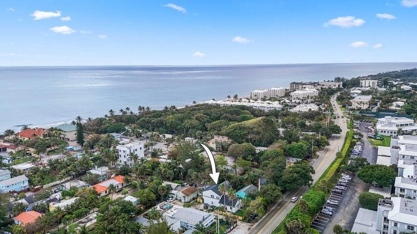 RARE INVESTMENT OPPORTUNITY! ABSOLUTELY GORGEOUS FULLY RENOVATED TRIPLEX | PRIME BOYNTON BEACH LOCATION | WALK/BIKE TO BEACH | NEW 2023 ROOF | OVERSIZED LOT ON QUIET STREET | Bright Open Floor Plan | Dramatic Volume Ceilings | Freshly Painted | LED Recessed Lighting | Eat-In Kitchen | Granite Counters | Custom Wood Cabinets | Breakfast Bar | Open Patio | Immaculate Tropical Landscaping & Outdoor Lighting | Turf Grass & Putting Green | Lots of Parking | Minutes to Beach, Delray Beach Atlantic Ave | Top Rated Schools | ROOF 2023 | WH 2023 | AC 2023 | Present All Offers!