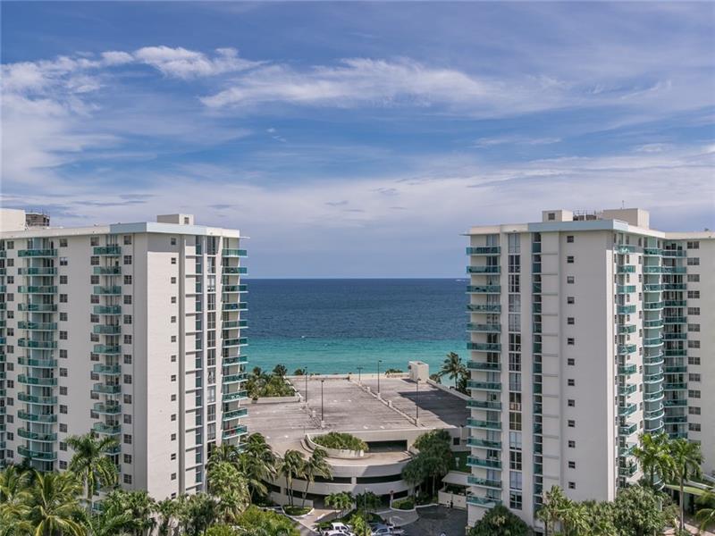 HERE IT IS - OPEN KITCHEN  + GRANITE - TOTALLY RENOVATED.  ALL AGE LUXURY BUILDING, OCEAN VIEW, 2/2, GLASS BALCONIES, NEW IMPACT WINDOWS AND PATIO DOORS, PORCELAIN FLOORS, RECESSED LIGHTING, CROWN MOLDINGS, LOTS OF CLOSETS, FURNISHED, UNIT HAS ONE GARAGE PARKING AND ADDITIONAL PARKING SPOTS CAN BE RENTED. MOVE RIGHT IN "READY".ALL AGE BUILDING, CAN BE RENTED OUT RIGHT AWAY, SPECIAL ASSESSMENTS ARE ALL PAID, 40 YEAR CERTIFICATION COMPLETED, HEATED POOL ON INTRACOSTAL, SAUNA, GYM, BILLIARDS, PING PONG, BBQ, SECURITY, COURTESY BUS, VALET PARKING, HI SPEED INTERNET, CARD ROOM, PARTY ROOM, ACROSS THE STREET FROM BEACH AND DIPLOMAT RESORT, NEAR AIRPORTS, RESTAURANTS, CASINOS, WALMART AND SHOPPING MALLS. RENTALS ARE ALLOWED IMMEDIATELY.