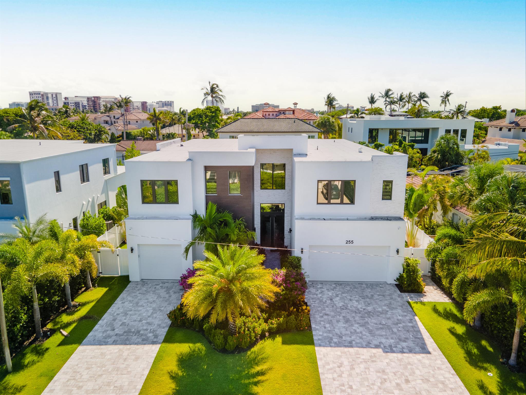 This architectural masterpiece, crafted by Mizner Development, boasts 5 bedrooms, 5.5 bathrooms, and an expansive 5446 square feet of living space. As you step inside, you'll be greeted by a grand open floor plan with two-story ceilings, creating a bright and airy ambiance. The open concept kitchen is a chef's dream, featuring top-of-the-line Wolf and Gagenau appliances.
The first floor encompasses a VIP suite, office, and a club room, while the second floor hosts four bedrooms, each with its private bath. The primary suite is a true retreat, offering an expansive spa-like bathroom, dual closets, and a private balcony, perfect for enjoying the serene surroundings.
Outside, a pavered backyard awaits, complete with a heated pool and spa, providing the ideal space for unwinding after a day at the beach.

Don't miss the opportunity to make this exceptional residence your own and indulge in the ultimate coastal lifestyle. Schedule a showing today and experience the epitome of elegance and luxury living in Boca Raton.