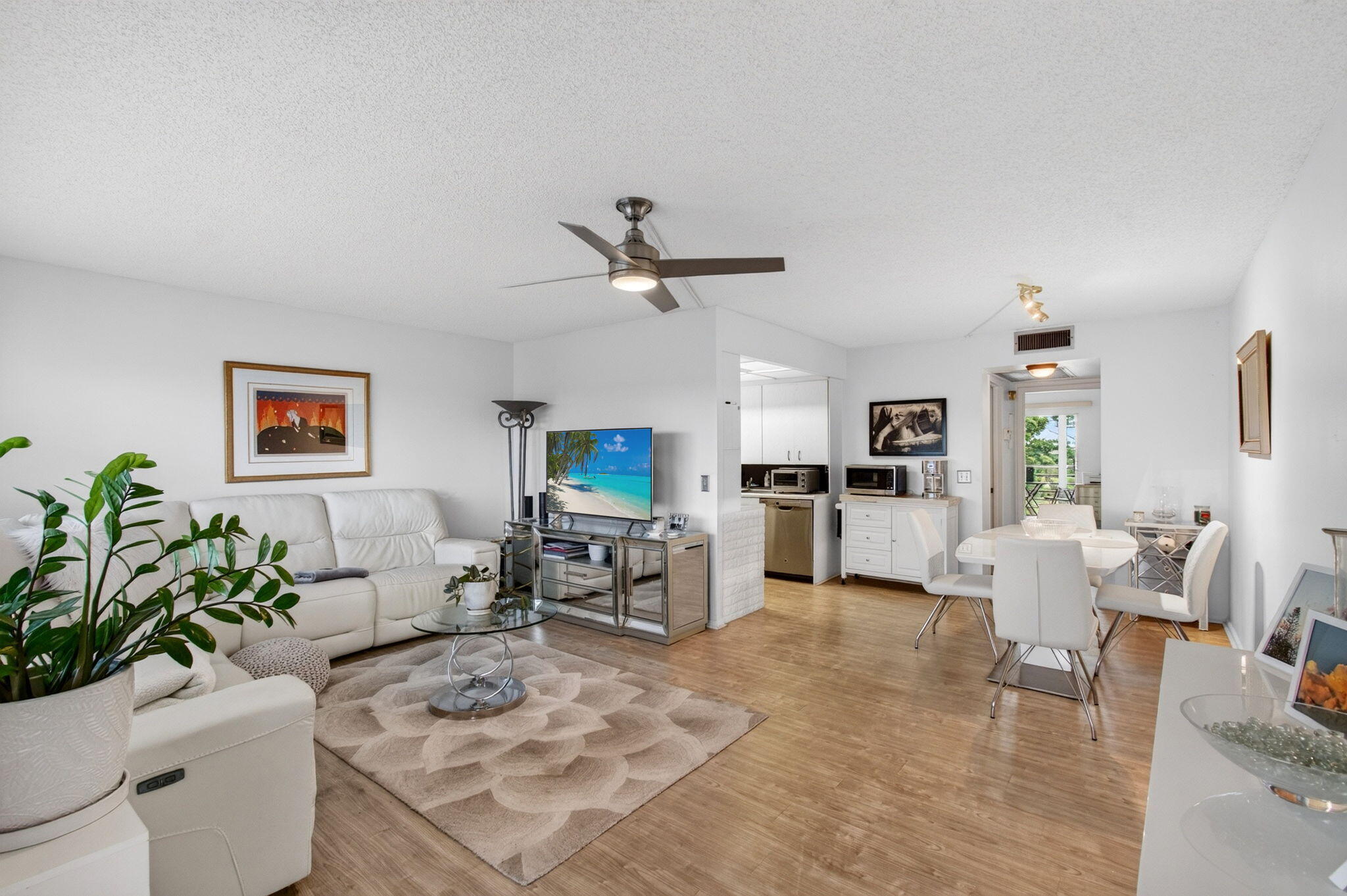 CENTURY VILLAGE--SUPER ACTIVE ADULT COMMUNITY--55+ Community.   MOTIVATED SELLER!  Situated in the heart of Boca Raton, 4048 Rexford C presents a great opportunity in the prestigious Rexford section of Century Village. This prime fourth-floor unit offers exceptional privacy and sweeping views of the picturesque landscape. Located by the elevator with the parking spot right under the condo.   Surrounded by tranquil water features, the setting is truly idyllic—a daily retreat where rustling leaves and the gentle lapping of the lake create a peaceful, harmonious atmosphere.  This oversized one-bedroom with one and a half bathrooms is bright and spacious. Newer stainless steel appliances, Central AC, and built-in closets throughout. The property is notably fitted with a sizable, sun-drenched swimming pool located at the front, beckoning residents to take a rejuvenating swim or enjoy a leisurely sunbath. An expansive rear patio complements the living space and is protected by screens and storm shutters. Whether used as a tranquil breakfast nook, a venue for social gatherings, or a serene home office, the patio's adaptability expands the property's possibilities.  Accessibility features are well-planned within this property - the proximity to the laundry room and elevator ensures a seamless living experience.   Living in Century Village means embracing a vibrant, active lifestyle with access to a wealth of amenities. Residents enjoy state-of-the-art fitness centers, social venues, performance theaters, and a variety of sports courts, including those for tennis, pickleball, bocce ball, and shuffleboard. Both indoor and outdoor pools offer year-round relaxation and recreation. Convenient shuttle bus service and dedicated community transportation make getting around effortless, while the close proximity to places of worship fosters a strong sense of community. This residence is ideal for those seeking a harmonious blend of tranquility, community engagement, and leisure—all within the highly regarded Century Village Active Adult Community. Experience the best of Boca Raton living and discover the unique lifestyle that awaits at 4048 Rexford C.  Seize the chance to enjoy an enviable lifestyle in desirable Boca Raton. 4048 Rexford C is ready to deliver comfort, convenience, and a touch of luxury in a single, inviting package. With a motivated seller, this is your opportunity to make a rewarding investment in one of South Florida's most sought-after communities.  TOTAL MONTHLY HOA--$820.55  Monthly Rexford HOA $512.55+ Monthly Cen-West HOA $308--Internet, basic cable, and water are included in the HOA.   A/C—2021  Newer Stainless Steel Appliances The unit could be offered fully furnished. No Corp, No LLC, No Investors, Rentable after 2 years of ownership.  Move-in and move-out Mon-Sun from 8 AM-6 PM.