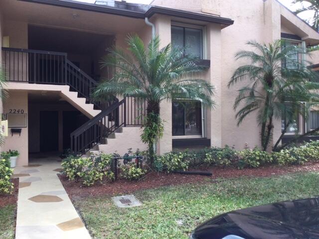 Beautiful spacious first  floor garden apartment with spectacular view of lake and golf. Screened in patio with pull down shutters and accordion shutters on all other windows. Eat in Kitchen and full size washer and dryer in kitchen area. Storage room and community pool. This is a bargain and a MUST SEE!