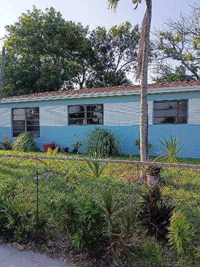 Welcome to this charming three-bedroom, 2 baths single-family residence in Golden Heights Homes, Fort Lauderdale. Offering 1,040 square feet of finished living space on one floor, this home provides practical layout and comfortable proportions for various living arrangements. Mango tree is available in the backyard for your enjoyment. The house features a very good size backyard. This house is a great opportunity for investment. it is also perfect for first time home buyers. The driveway can fit several cars. A new roof had been installed in the year 2025. In addition to the 3/2, an efficiency is also available in the property. Such efficiency will allow the new buyers to have extra income. Call today before the property is gone. The property is priced to sell. Do not delay