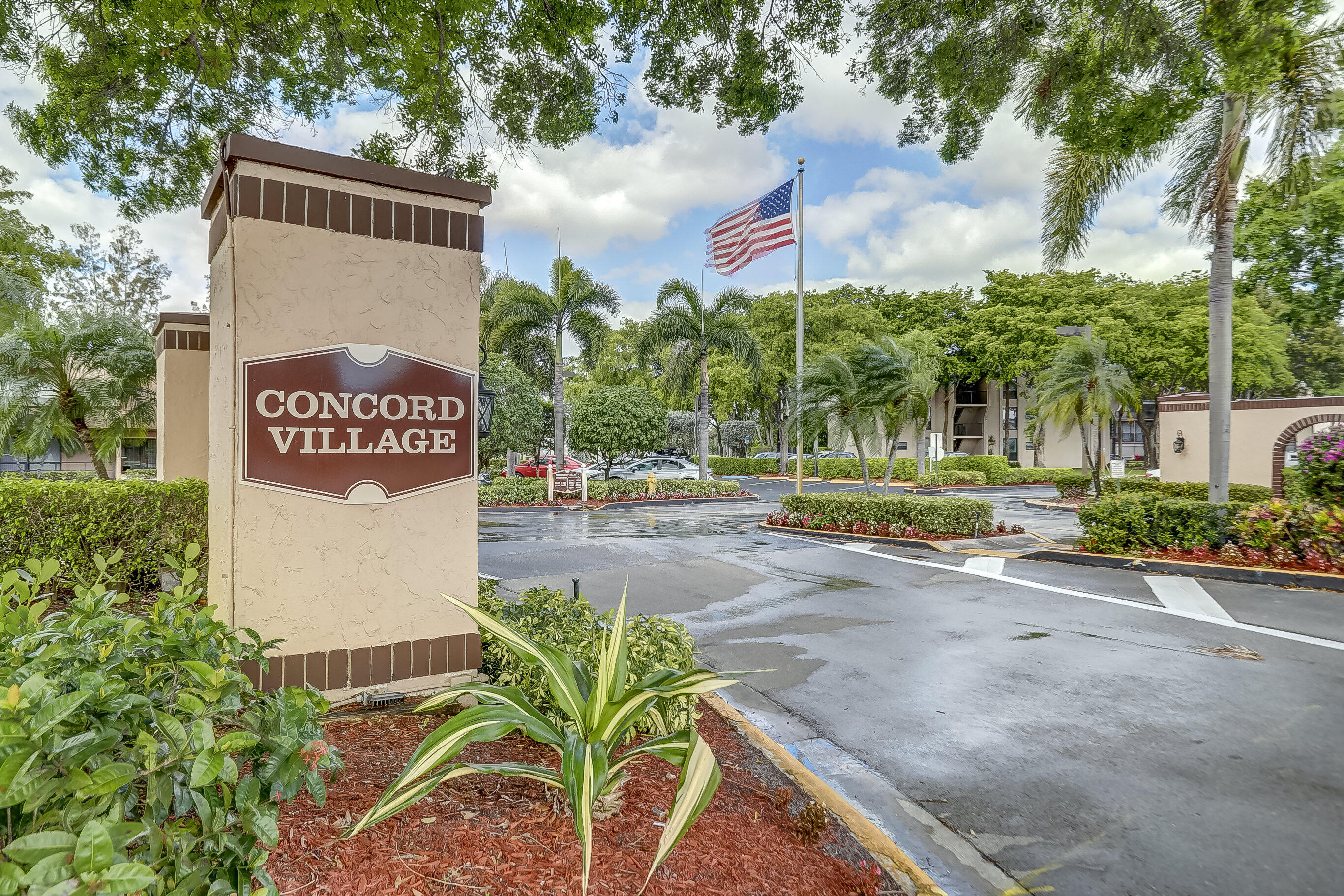 All ages, Investor friendly and beautifully maintained 2 bed, 2 bath residence in Concord Village's desirable Building 6. This home offers spacious interiors, walk-in closets, a private balcony with tranquil garden views, and refined tile/laminate flooring. Brand new water heater. In unit washer and dryer. Immediate rental ability and no assessments. New Roof and freshly painted building.  Ideally positioned at the University Dr & McNab corridor, moments from premier shopping, dining, and major highways. A rare blend of comfort, convenience, and value in a prime Tamarac location.   Easy to show.  Schedule your private tour today!