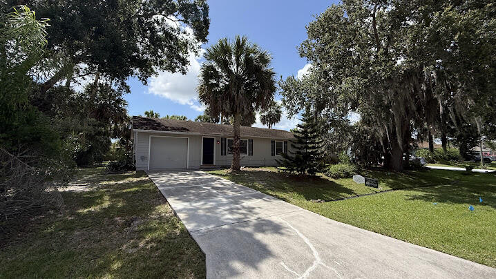 Nestled near Oak Hammock Park and just minutes from I-95, this 912-square-foot, two-bedroom, one-bath home offers both comfort and convenience. The home features warm Mexican tile in the living areas and ceramic tile in the bedrooms. You'll love the large fenced backyard—perfect for pets or outdoor gatherings—and the convenience of a one-car garage. With the park nearby offering walking trails, a playground, and a boat ramp to the C-24 Canal, this pet-friendly home is ready for its next chapter!
