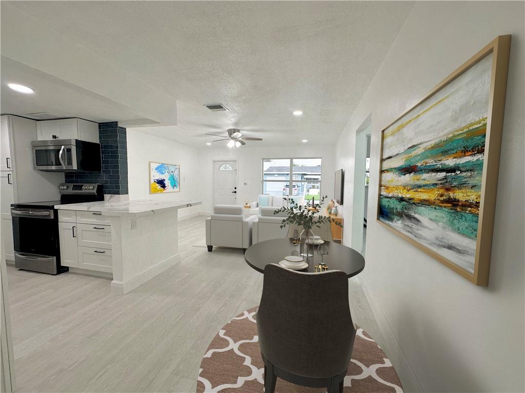 Luxury living is here! 55+ community. Hurricane windows & doors! PGT impact windows - no expense was spared! Beautiful 3/2 home that was recently painted inside and out. Roof is from 2019. Open floor concept with tons of natural light. This is a very nice tree lined street in The Mainlands with no thru traffic. This is a great street and very quiet. 100% waterproof SPC vinyl flooring was recently installed. Light and bright floor plan - the home feels very spacious! Master bathroom is huge! Located within minutes to Turnpike, i-95, and even the beach! Walking distance to Publix and various other strip mall shopping locations. Two large fruit trees in the back yard. HOA is $90 per Qtr. No permanent residents under the age of 18. Owner agent.