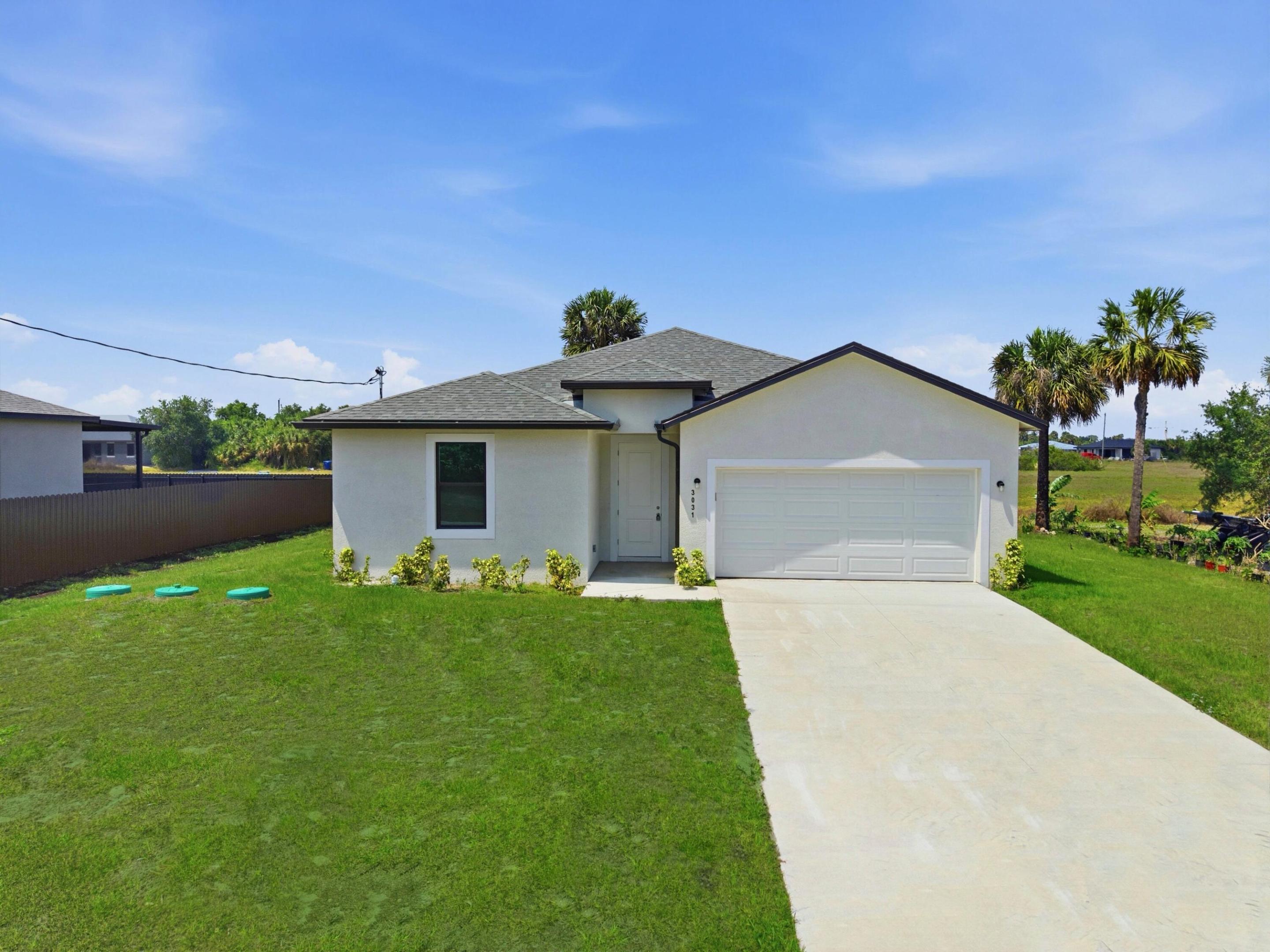 Brand new construction in the growing LaBelle area! This beautifully designed 3 bedroom, 2 bath home offers 2,060 sq ft of living space with a spacious open- concept layout ideal for modern living.   The home features a 2 car garage, covered patio, and sits on a generous 0.24 acre lot, providing plenty of space for outdoor enjoyment.  Inside, enjoy a bright and airy floor plan with a large kitchen overlooking the main living area- perfect for entertaining.   Conveniently located near local schools and less than a mile from both elementary and high school, this home offers easy access to everyday essentials while maintaining a quiet residential feel. NO HOA. Schedule your showing today!