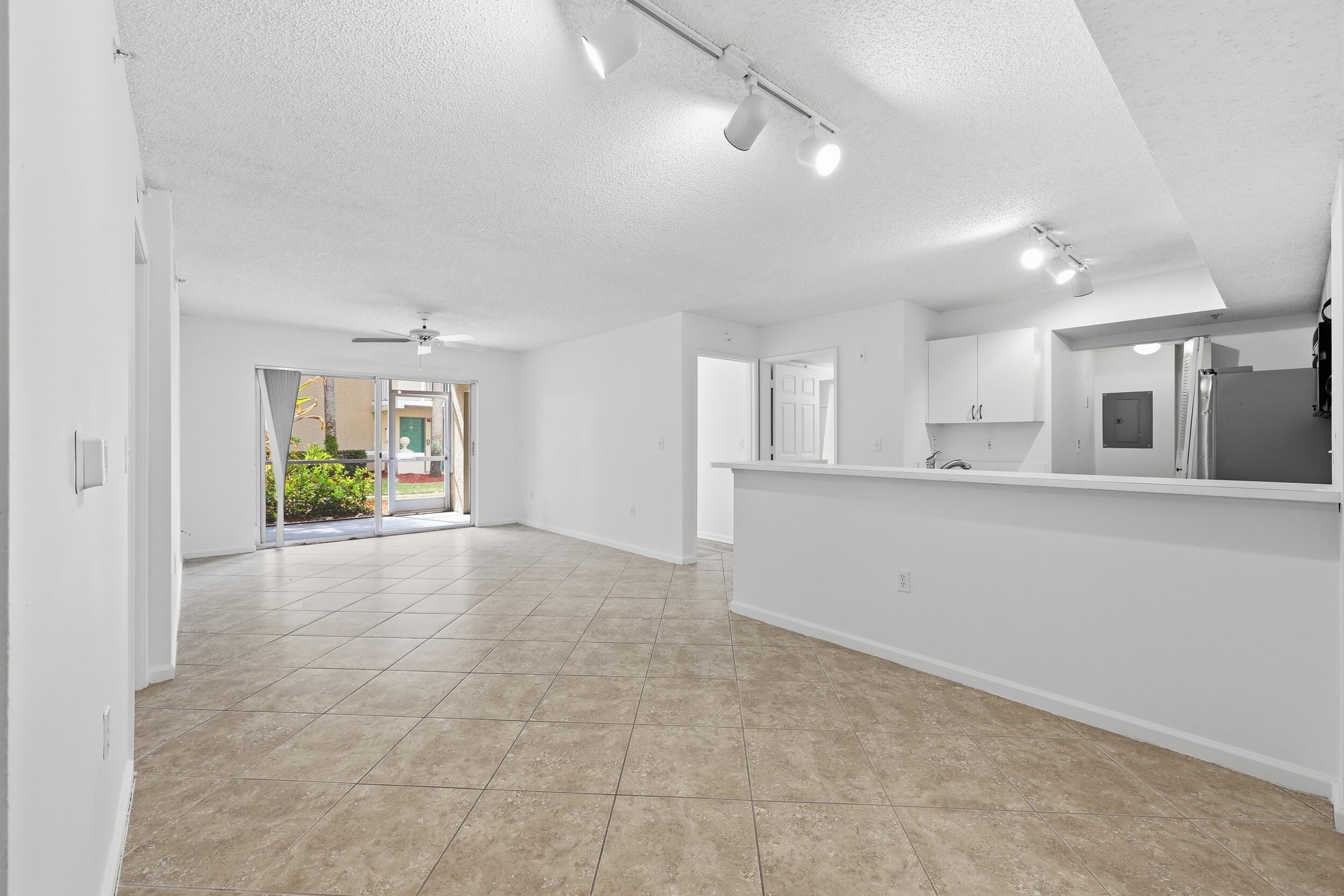A first-floor corner condo in one of the community's best locations.

This two-bedroom, two-bath residence offers a bright, open-concept living and kitchen layout with easy, single-level entry. Natural light fills the space thanks to its corner positioning, creating a light and airy feel throughout.

Step out to your private patio where a sidewalk leads directly to the pool and tennis courts, all with a peaceful fountain view just beyond. It's the perfect blend of privacy and convenience.

Located in the heart of Tequesta, you're just minutes from local shops, dining, and everything this charming village has to offer. A wonderful opportunity to make it your own in an unbeatable setting.