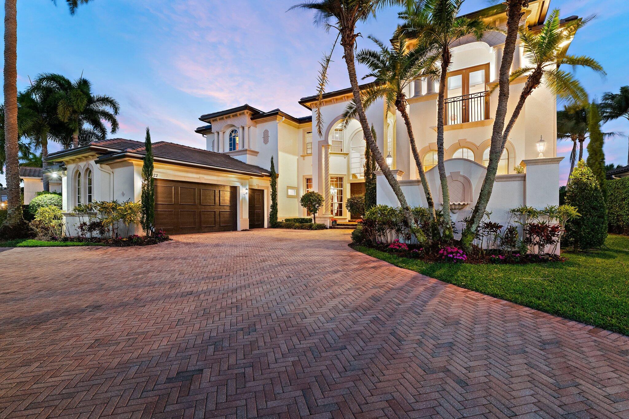 This is a rare opportunity to acquire one of Frenchman's Reserve's finest addresses and make it your own. Experience the premier Frenchman's Reserve lifestyle in this coveted Villa Rosa estate, situated just a block away from the Club in the heart of Palm Beach Gardens. Set on an exceptional lot with unrivaled lake and Arnold Palmer championship golf course views, this home offers a brand-new roof (2025) and is an extraordinary opportunity to personalize a luxury residence in one of the area's most exclusive country club communities. From the moment you open the double doors, soaring 24' ceilings and a wall of floor-to-ceiling windows fill the home with natural light and showcase stunning views of the tranquil lake and golf course. This luxury residence offers 5 bedrooms, 5 full bathrooms, 2 half bathrooms, a spacious loft, a separate library, and a dedicated home theater/movie room. The kitchen flows seamlessly into the family room and casual dining area, creating an open-concept space perfect for entertaining. A wet bar with bar seating completes the formal living and dining room entertaining areas. The elegant loft overlooks the main living room, adding openness and architectural drama to the heart of the home. The primary suite features the same breathtaking golf, water and pool views, his-and-hers walk-in closets with custom built-ins, and an adjoining room that can serve as a gym, office, or dressing area, with dual bathrooms for ultimate convenience. First floor also includes a private guest bedroom with ensuite bath and 2 half baths. Upstairs, four gracious guest suites provide private retreats, including a secondary primary suite with a private balcony, walk-in closet, and an oversized spa bathroom. A circular driveway and 2-car + golf cart garage provide both striking curb appeal and functional convenience. EV charger ready! Outdoor living includes a heated pool, spa, and expansive gated patio for year-round enjoyment. This home is more than a residence-it's a lifestyle. Residents of Frenchman's Reserve enjoy world-class amenities including golf, tennis and pickleball courts, a state-of-the-art fitness center, resort-style clubhouse with fabulous dining options and a Kids Club. A social/sports membership is required, with the option to join the golf exchange program for additional golfing privileges.