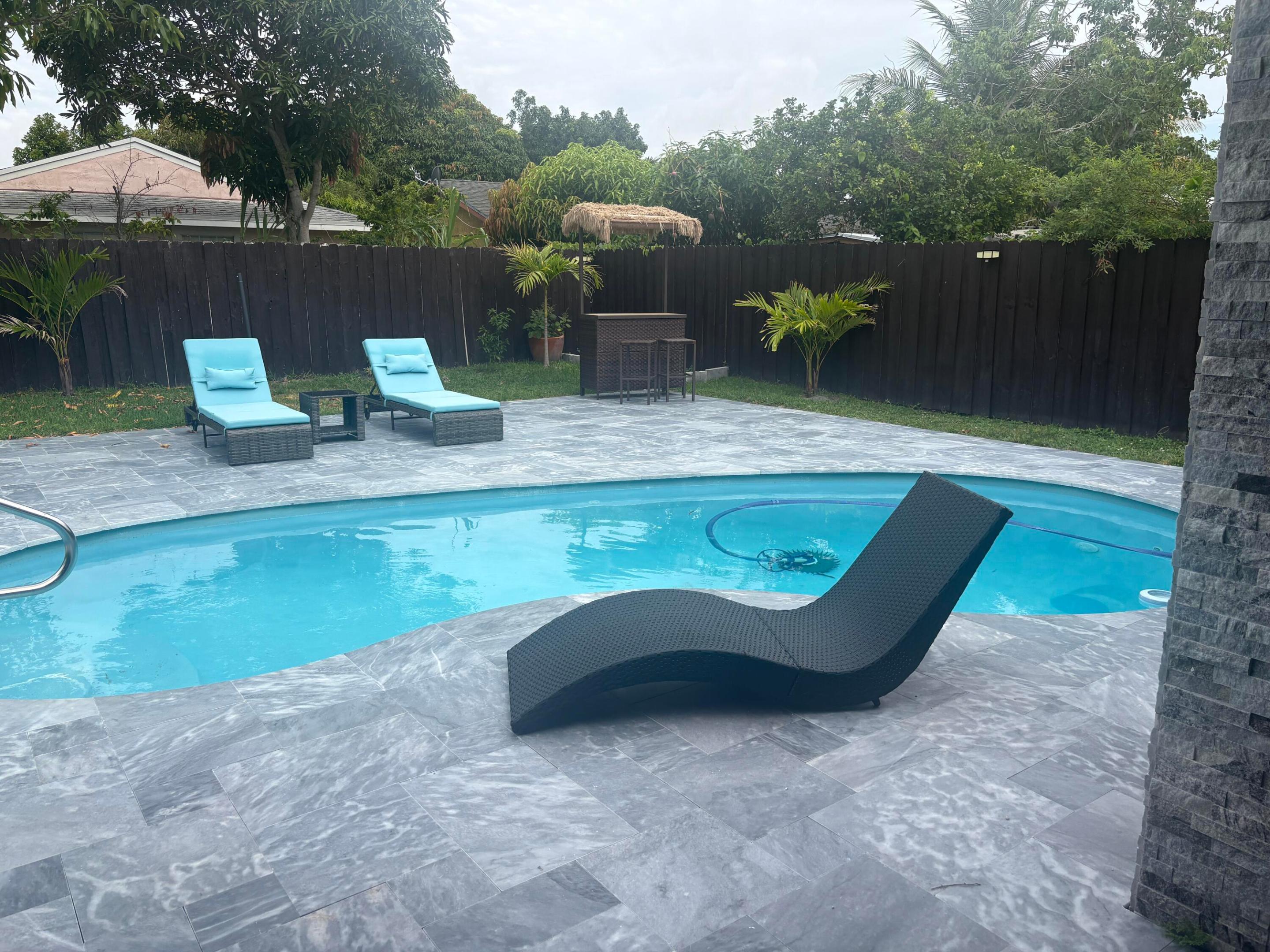 Don't miss this incredible opportunity to own a spacious 4-bedroom split-floor-plan home situated on a desirable corner lot in the heart of Delray Beach! Featuring a private swimming pool and a prime location just minutes from vibrant downtown Delray, this property offers the perfect blend of comfort, convenience, and potential. Directly across the street is the newly renovated Barwick Park, providing endless opportunities for outdoor recreation, family activities, and community events.  Best of all, there's no HOA, giving you the freedom and flexibility to truly make this home your own. Major updates have already been completed, including a new roof (2022), A/C system (2019), and kitchen appliances less than five years old.