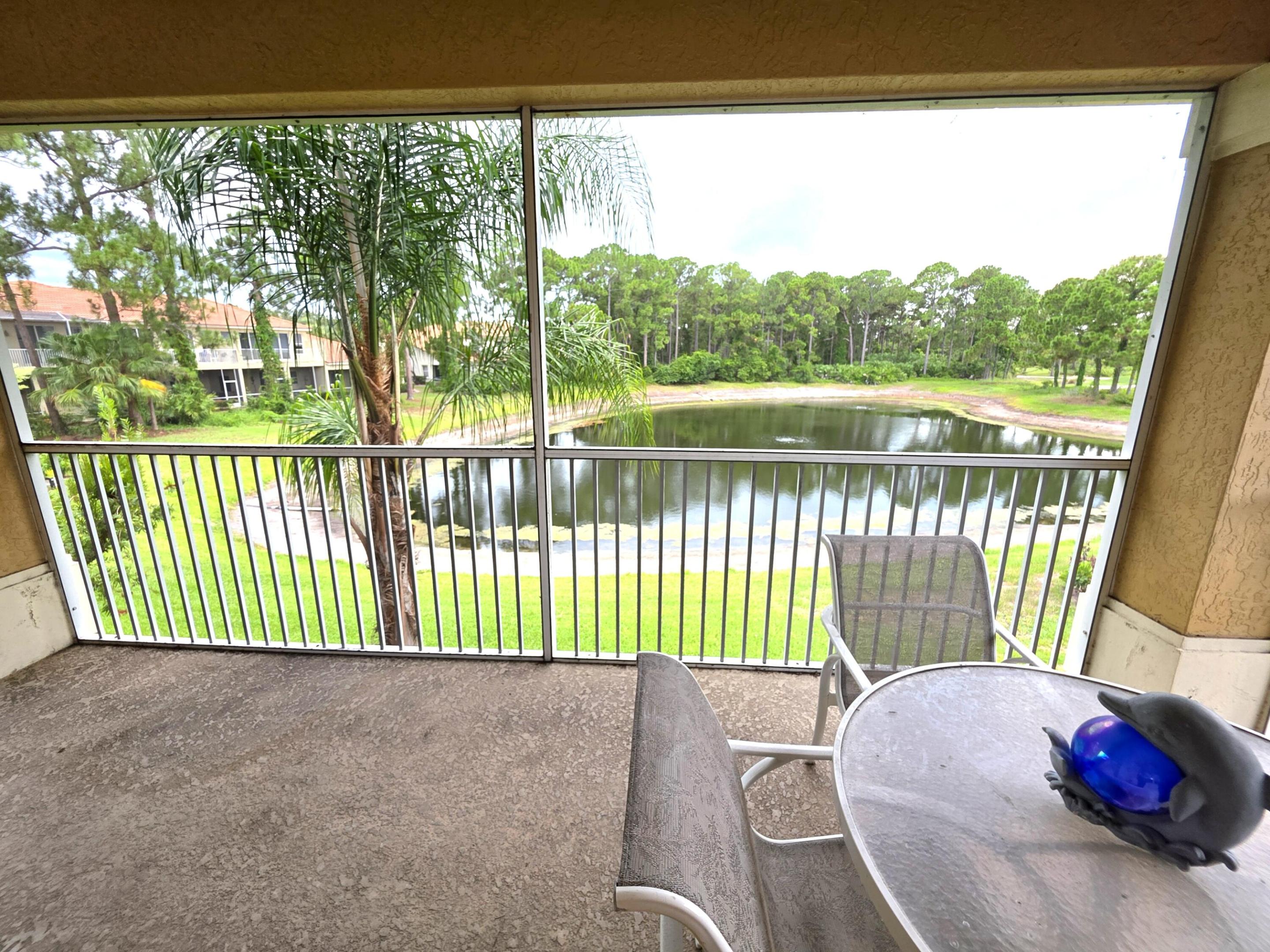 Relax and enjoy the view! Welcome to Castle Pines, part of PGA Village. This 1 bedroom, 1.5 bath condo features a bright living area, functional kitchen, guest half bath, and a spacious screened porch with peaceful pond and golf course views. Gated with security guard, great amenities, and a convenient location just  2 minutes from I-95 for easy travel north or south, plus close to nearby shopping, restaurants, and everyday conveniences. Do not miss this opportunity.