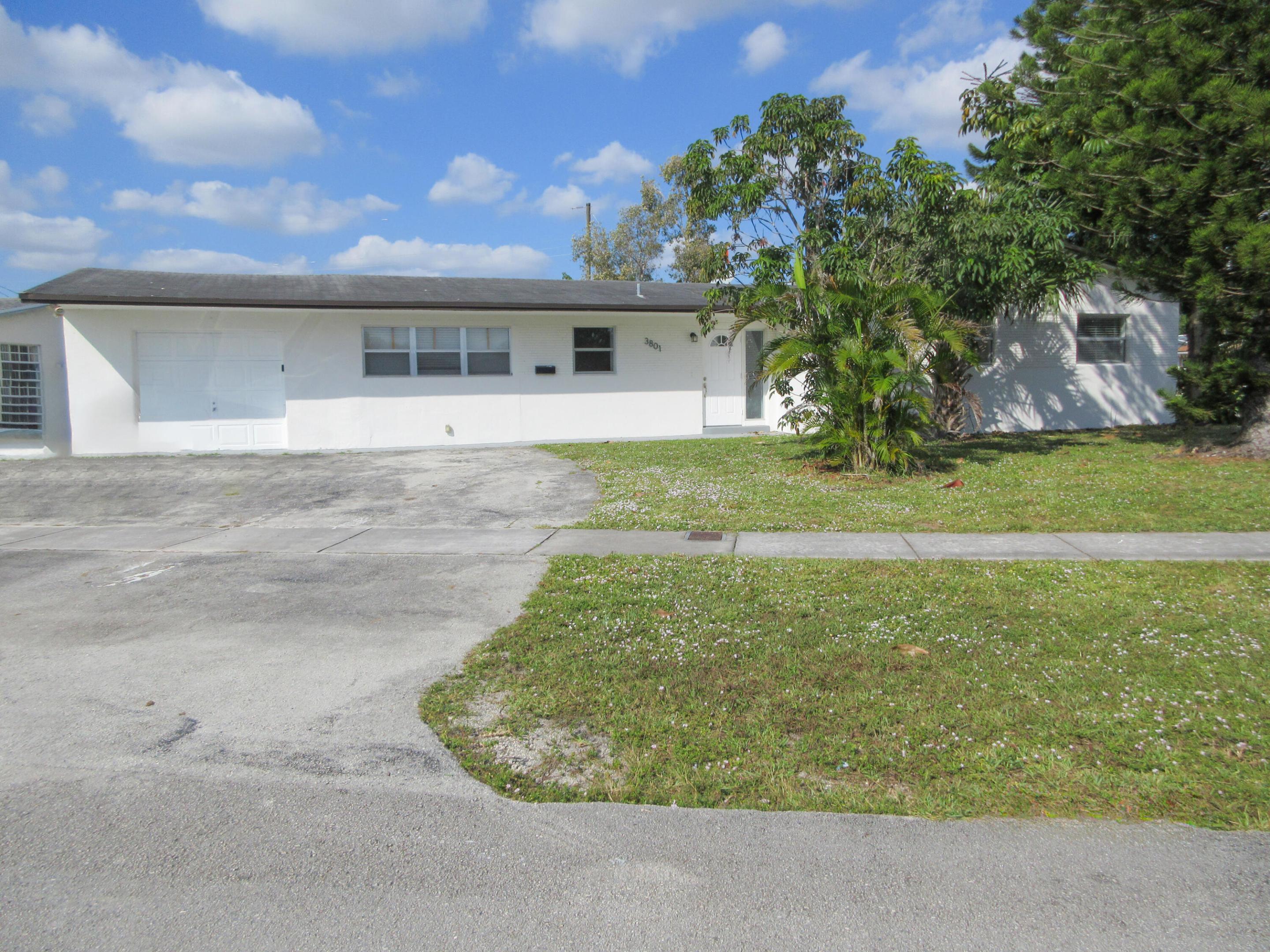 Updated 3/2 single family pool home. Updated kitchen. Laminate and tile flooring living areas and bedrooms. Large additional room may be used as a 4th bedroom/ office or a den. Real brick fireplace! Oversized 1 car garage. In ground Pool with safety enclosure and newer pool equipment. New roof and sewer pipe plumbing. Large fenced yard on corner lot. Voluntary Home Owners Association. Near shopping, schools and much more.