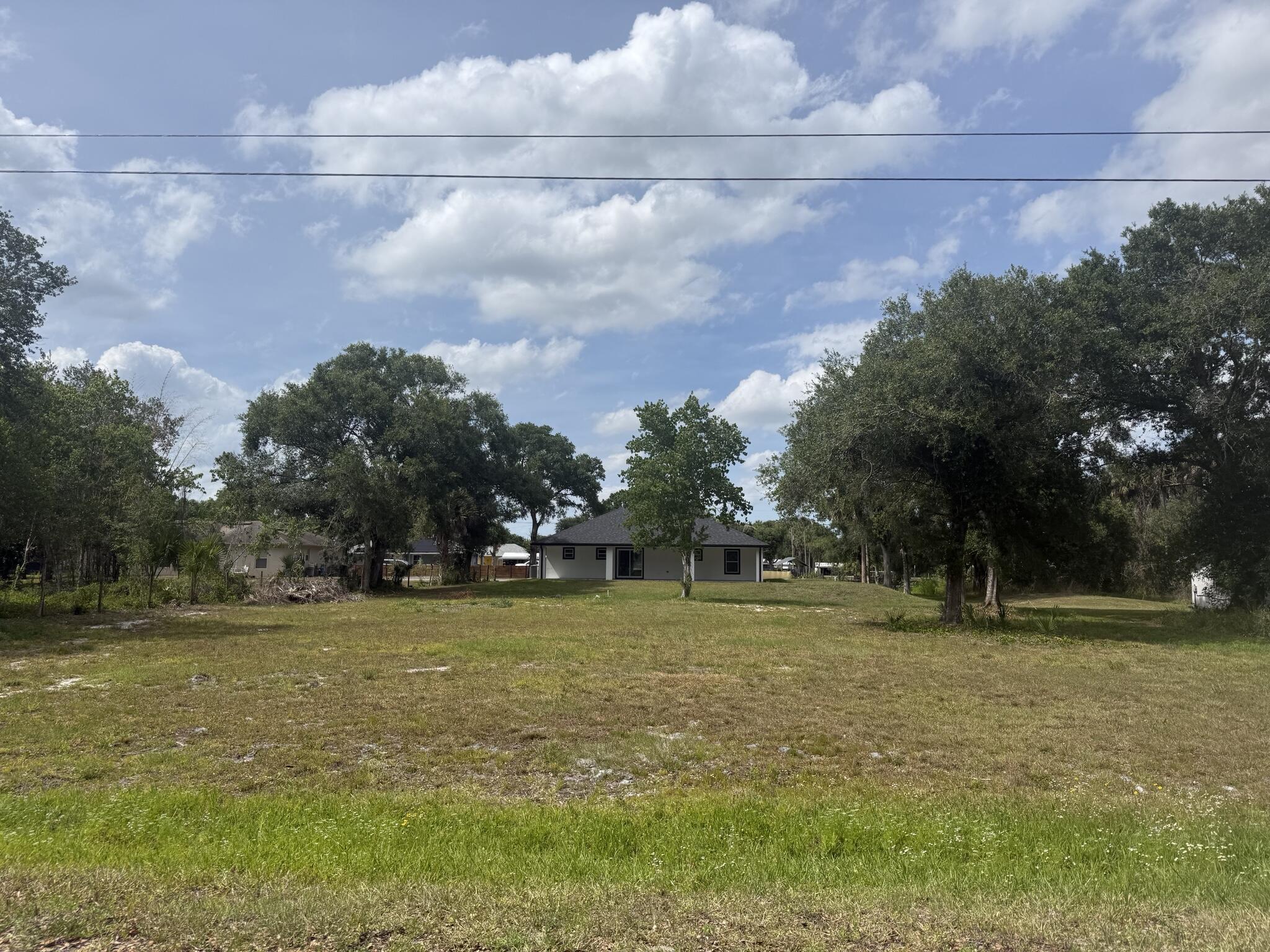 Discover the opportunity to own a beautiful vacant lot located at 7555 NW 82nd Court in Okeechobee, Florida, nestled within the desirable Dixie Ranch Estates area. This spacious parcel offers a peaceful rural setting surrounded by natural Florida landscape, ideal for those seeking privacy, space, and country living while still being a short drive to town conveniences. Whether you're looking to build now or invest for the future, this lot offers flexibility and long-term potential in one of Okeechobee's steadily developing rural communities. A great opportunity to secure land in growing Okeechobee County with no HOA restrictions in many surrounding parcels.