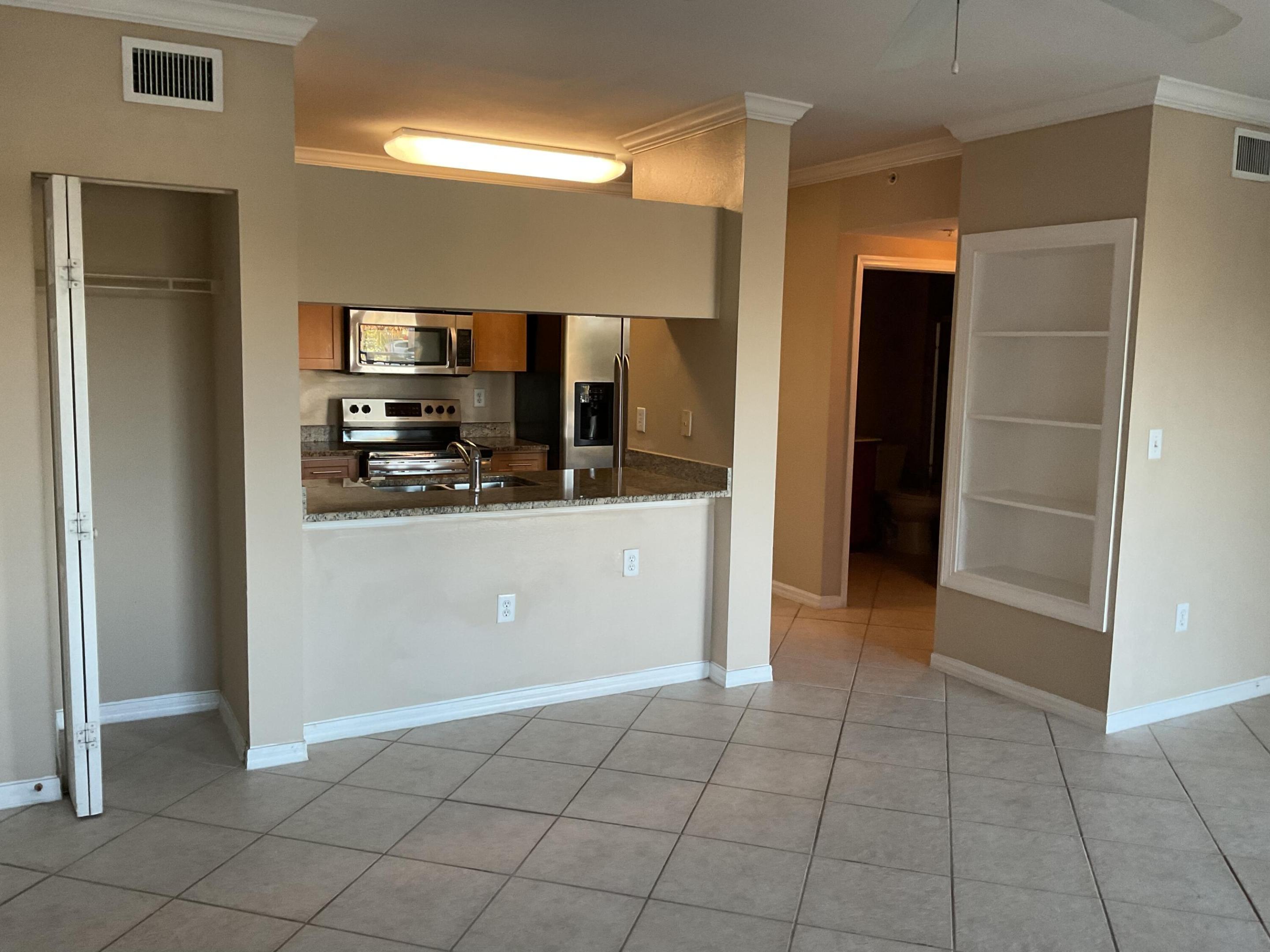 The Villas at Emerald Dunes is a unique resort style community, located on lush tropical grounds. This spacious & beautiful, 1 bedroom 1 bath, includes water/sewer, trash & basic cable in the rent. This one-of-a-kind community not only offers stunning views, exceptional quality and so much more. Just a few of the features include private terraces, full size washer/dryer, walk-in closet, granite countertops, stainless steel appliances, garden tub.  Crown molding in living room & dining room, hurricane resistant windows, tile flooring throughout, luxury vinyl plank in bedroom. Other amenities include 2 resort style swimming pools w/sundeck, mediation garden, picnic/grilling areas, controlled access gates,2 state of the art fitness centers, tennis court & your very own putting green.  All this while living at an exquisite community, and the convenience of being minutes from downtown WBP, Palm Beach International Airport, the FL Turnpike and so much more.