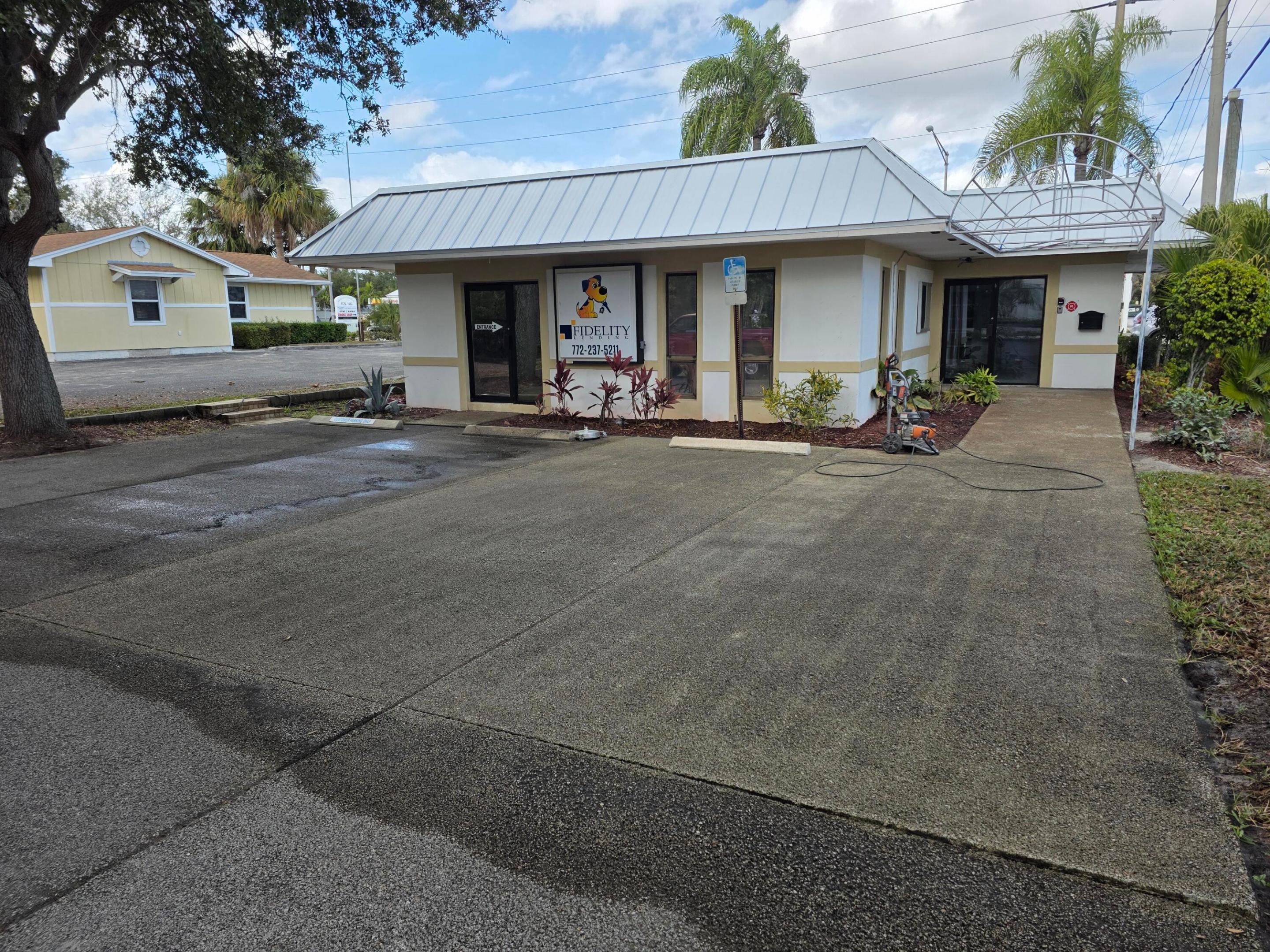 Turn-key 1,600± SF freestanding office building in a prime Palm City location! Situated on a highly visible corner lot with excellent access and strong traffic exposure, this fully remodeled property is just 2 miles from I-95 and minutes from area beaches and the airport. Features include 8 private offices, a reception/lobby area, 2 fully renovated bathrooms, ceramic tile flooring throughout, fresh paint, and updated trim. Two separate entrances offer flexibility for a single user or potential division into two suites. Recent improvements include a new roof (2025). Ample parking for 8+ vehicles and attractive mature landscaping enhance curb appeal. Ideal for professional, medical, or service-based businesses seeking a move-in-ready office with exceptional visibility and convenience.