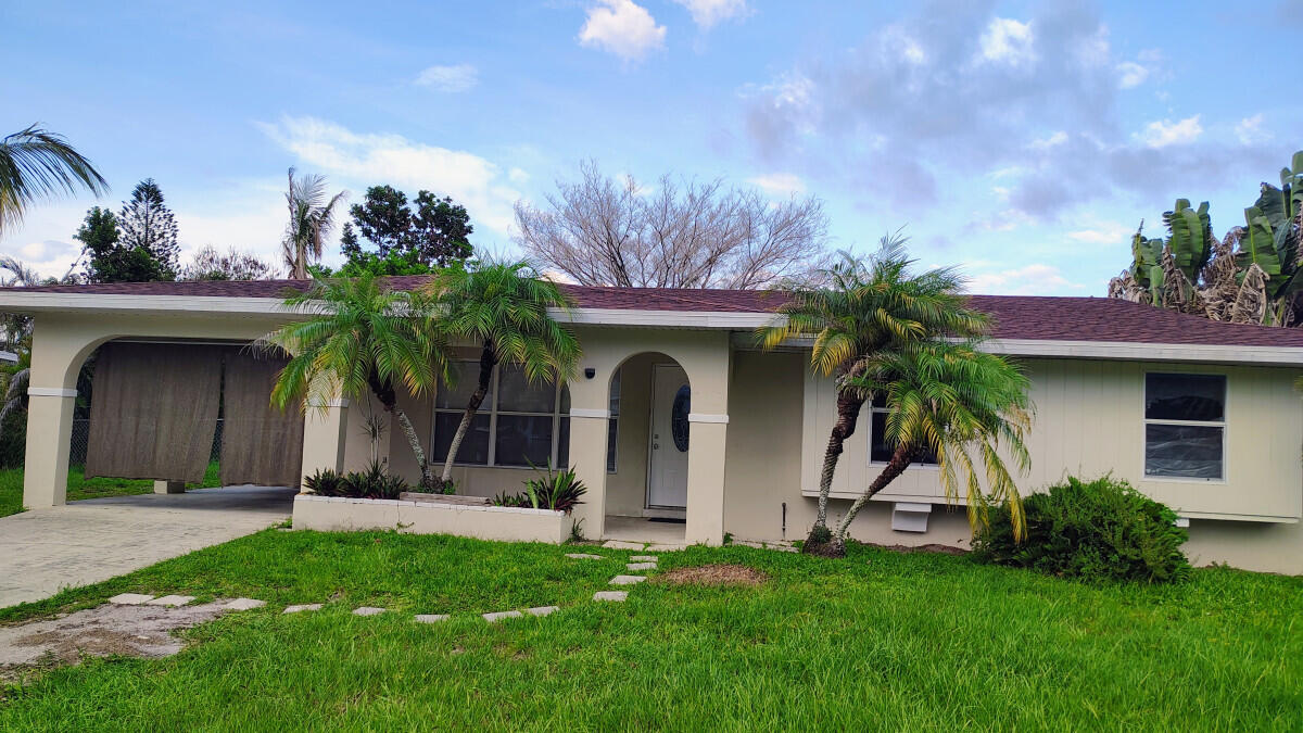 Welcome to this well-maintained 3-bedroom, 2-bath single-family home in the established River Park area of Port St. Lucie. Offering 1,136 square feet of comfortable living space on an oversized 0.23-acre lot, this property is ideal for first-time homebuyers, seasonal residents, downsizers, or investors. Recent updates include a **new roof (2021)** and **fresh interior paint**, providing peace of mind and a move-in-ready feel. The functional floor plan is filled with natural light and offers comfortable living areas ready for your personal touch. Step outside to enjoy the expansive backyard with plenty of room for entertaining, gardening, or creating your own outdoor retreat. Conveniently located near shopping, dining, parks, schools, medical facilities, and major highways, this home comb