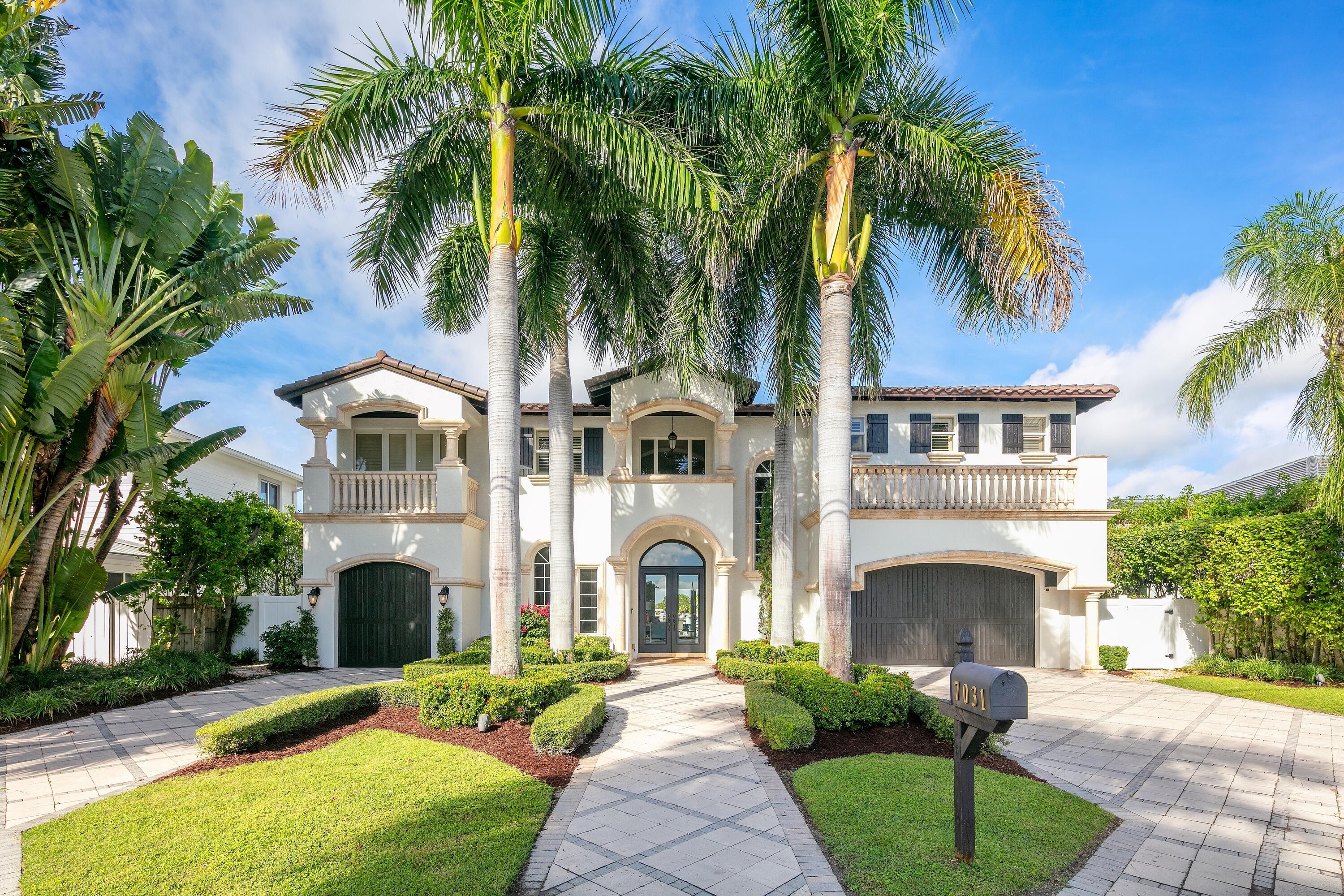 Spectacular Custom Estate on a super premium 85' +/-  Deepwater lot with resort-style outdoor oasis and mesmerizing sunset views!  New roof! Full impact glass. All bedrooms on 2nd floor, 2 fireplaces, exterior yard area for play, pool and spa, 2 covered 2nd story balconies,1st floor loggia complete with  outdoor gas operated summer kitchen.