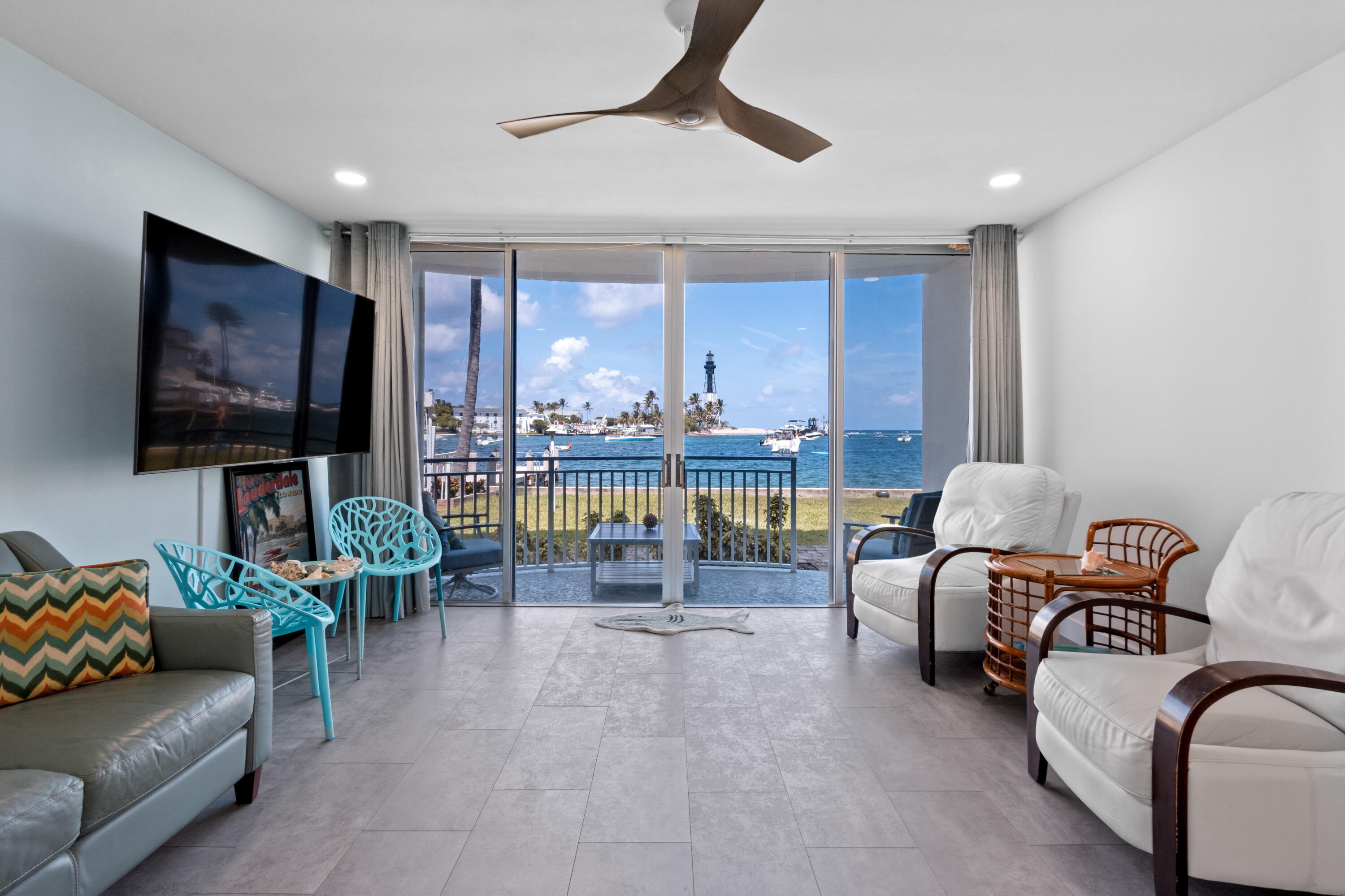 Wake up to spectacular views of the iconic Hillsboro Lighthouse and sparkling ocean inlet waters  from this beautifully renovated coastal retreat. Filled with natural light and completely updated throughout, this move in ready residence offers a fresh, modern feel and has not been occupied since renovation. Enjoy watching boats cruise by while taking in some of the most picturesque waterfront views in the area. Conveniently located near the Hillsboro Inlet, waterfront restaurants, water taxi service, and beach access. Whether you're seeking a weekend getaway, seasonal residence, investment property, or low maintenance year round living, this charming waterfront retreat offers the best of the South Florida lifestyle.