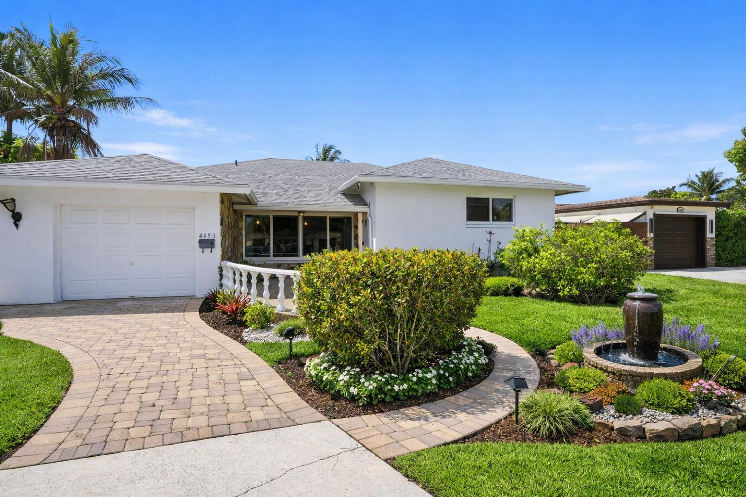 STUNNING SCALE & ULTIMATE PROTECTION! Welcome to one of the largest and most secure homes in the community. This canal-front estate features a Brand New Roof (2022) and Complete Impact Windows & Doors (2022), offering massive insurance savings and peace of mind. Boasting over 2,100 sq. ft. of living space, this home is rich with architectural character and ready for your modern touch.he backyard is a private tropical oasis with an oversized screened-in pool, a covered patio with an outdoor kitchen, and a variety of mature fruit trees. With 3 full bathrooms and a spacious layout, this is a rare find. NO HOA! Structural upgrades are done bring your vision and make this estate your own. Must see to believe! Roof is 2022