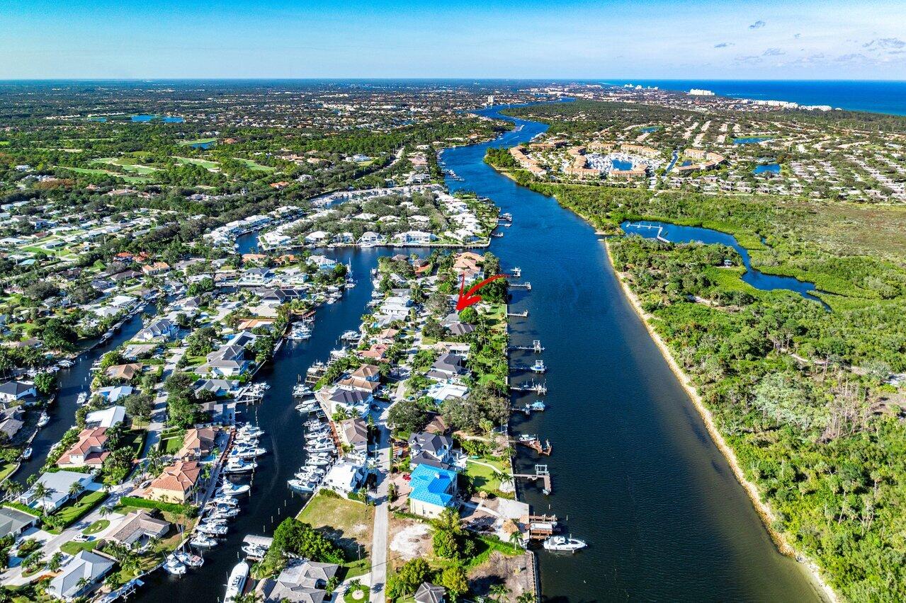 A rare waterfront property nestled in between 2 Inlets. This is a fantastic opportunity to build your dream home on a hard-to-find direct Intracoastal property. With no fixed bridges, there's ample room for a dock, and the seawall was redone just two years ago, ensuring peace of mind for waterfront living. The property is being sold as-is and for land value, offering a blank canvas for your vision. This is a unique chance to own a piece of paradise that has never been on the market before, as it comes from the original owner. Imagine waking up to stunning water views and enjoying the serene lifestyle that comes with living on the Intracoastal. This property offers endless possibilities.