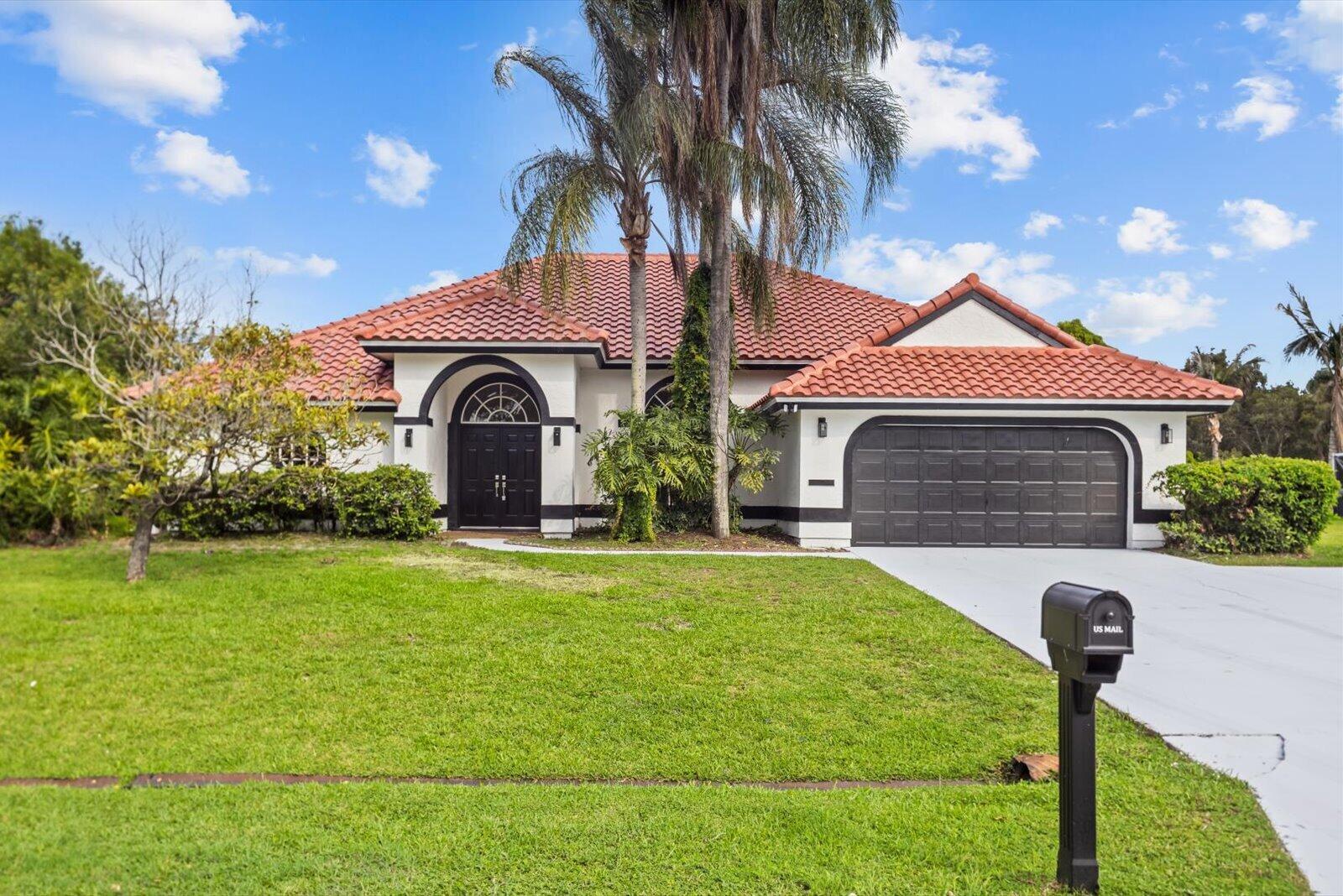 Showings must be scheduled with Showingtime. Exquisite 4-bedroom, 2-bathroom residence, fully renovated in 2026. 2026 Tile Roof, 2026 AC! NO HOA! The gourmet kitchen boasts luminous quartz countertops, bespoke soft-close shaker cabinetry, and premium high-end finishes, designed to inspire culinary excellence. Luxurious spa-inspired bathrooms feature sophisticated tile work, gorgeous vanities, and contemporary fixtures, elevating daily rituals to a serene escape. Impeccable waterproof laminate flooring, freshly painted interiors and exteriors, and brand-new, top-tier appliances blend style with functionality. Enjoy Florida's lifestyle with premier shopping, and waterfront dining, with the freedom of no HOA restrictions. This residence seamlessly blends modern luxury with timeless comfort.