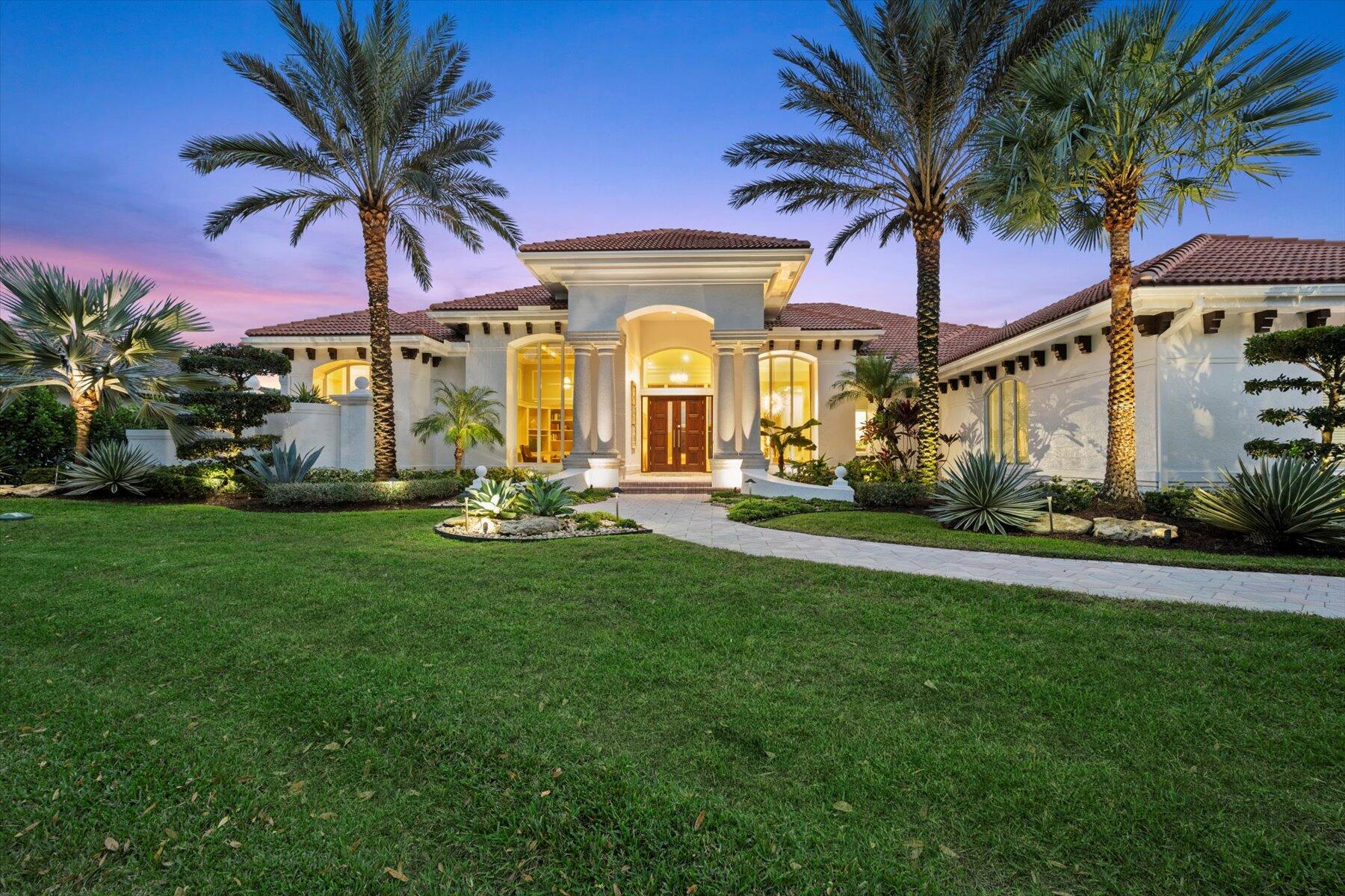 IMPRESSIVE custom estate home located in one of West Palm Beach's most desirable gated communities--BREAKERS WEST GOLF & COUNTRY CLUB. Situated on .61 acre lot on private cul-de-sac street with just 2 other homes, this stately 1-story home boasts approx 5,352 SF living area with 4 Bedrooms, 2 Offices, Game Room, 4.5 Baths and full 3 car garage. The minute you step inside you will be captivated by the high ceilings, floor-to-ceiling impact windows and pool and sweeping fairway views beyond. The Living Room is the perfect blend of today's clean design esthetic with classic South Florida details such as the stone fireplace, crown molding and marble floors. The adjoining Dining Room features a gorgeous sunburst chandelier and overlooks a tropical waterfall for memorable dining experiences. The Chef's Kitchen with center-island will become a favorite gathering spot with its white Shaker custom cabinetry, quartz counters with sleek waterfall edge and GE monogram stainless appliances (48' refrig, gas cooktop with hood, double ovens, warming drawer, microwave drawer and wine refrig). Adjoining the Kitchen is a spacious Family Room featuring a wall of 10ft folding impact doors that open to the patio for seamless indoor/outdoor living. Off the Family Room is a 22' x 21' Game Room for hours of fun with a pool table, TV for watching any sport you want, and bar area with ice maker, 2 wine refrigerators, and 2 beverage drawers and ample cabinet storage. 

The Primary Bedroom Suite is a luxurious retreat all to itself with coffered ceiling with crown molding, marble flooring throughout and curved picture window overlooking the pool but has blackout drapery for restful sleep. An inviting private covered patio open off the Primary bedrooms and is the perfect spot for morning coffee while checking emails. Inside the Primary Suite is separate room and could be ideal room for morning yoga, your Peloton, or an Office/sitting room. Two spacious custom fitted walk-in closets provide ample storage. 

The Primary Bath is bright and elegant with marble flooring, 2 marble vanities, large soaking tub, marble shower with frameless glass shower door and a beautiful chandelier as an elegant focal point.  Just outside the Primary Suite is handsome office with built-in bookcase, boxed beam coffered ceiling with crown molding and wonderful natural light from the floor to ceiling window. 

The popular split floor plan affords privacy for the 3 spacious Guest Bedrooms. Each has their own ensuite bathroom, double-door entry doors, porcelain tile wood flooring, remote controlled window shades, and spacious closets.  One "special" Guest Bedroom Suite offers 2 different and equally lovely views--one view overlooks the golf course and the other view is of the charming walled courtyard with marble stone pavers and a gas fire pit surrounded by beautiful landscaping and exterior lighting.  Every guest will enjoy the privacy of this special suite!

The outdoor area of this home is just as important as the inside. Landscaped by one of Palm Beach County best landscape design companies, the landscaping stands out for its stately canary palms and tropical plantings, all highlighted by gorgeous landscape lighting--creating  one of the most elegant Breakers West in the evening. With almost 1,800 SF of screened patio for outdoor entertaining, the gorgeous patio features a honed marble stone patio deck, heated, salt-chlorinated pool with sun shelf, a raised spa as well as 2 fire bowls with water fountains, creating the relaxing sounds of water. The outdoor bar with built-in grill, refrigerator and TV is perfect way to entertain South Florida style. With sweeping golf course views of the Breakers West Rees Jones Course 10th fairway as its backdrop, this home has it all!   

Additional updates include impact windows for majority of the home (10% have shutters), impact garage doors and impact front doors; roof replaced in 2018; 3 HVAC systems replaced in 2021; whole house generator and many SMART home features.

Breakers West is a unique country club community where club memberships are NOT mandatory. Breakers West residents have the choice of optional/non-mandatory club memberships at either Breakers West (including Breakers Beach Club in the Summer months) or memberships are Mayacoo Lakes Country Club. 

Breakers West is conveniently located to downtown West Palm Beach financial center known as "Wall Street South", Kravis Center, Norton Art Museum, Worth Ave shopping, Dixie Highway's eclectic shops, PBI airport as well as Wellington equestrian amenities. Don't miss this great opportunity to enjoy the Palm Beach County lifestyle this season!