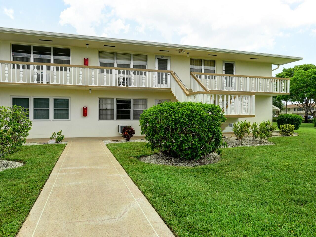 Centrally located first floor unit with Panoramic garden views from the back patio. EASY living. Freshly painted throughout. Tile flooring, New water heater, 2 wall A/C's, the Living Room A/C is new, 12k btu.  Updated en-suite primary Bath, as well as half-bath. South/North Exposure; cul-de-sac; Short walk to Popular Kent pool.  Century Village offers resort style amenities galore including a lavish clubhouse, 1,500 seat theater, premier performances, shuttle buses, state of the art gym, pickleball, putting greens, tennis, indoor & outdoor pools, movies, classes of every type & more! Close to shopping, restaurants.  Welcome Home!  2 monthly Assessments: $355.07 + $173.98.  Welcome to Century Village - West Palm Beach  Welcome to the world of South Florida social living at its absolute best. When you become the proud owner of a Century Village condominium, you begin the journey to experience the distinct Century Village "way of life" and luxurious recreational facilities.  At 92,0000 square foot the clubhouse occupies almost two acres. A spacious party room hosts many galas for your enjoyment. The state of the art, 1,221 seat theater is home to many well-known entertainers and shows recently released movies throughout the year. The clubhouse has numerous meeting rooms that host classes, hobbies, clubs, card games, an extensive library, billiards, bingo, music and other creative activities.  The popular health club offers personal training and all the latest in exercise equipment. Feel free to join in traditional aerobics, Yoga, Pilates, and dance classes. The wave-walking (resistance) pool provides valuable low impact health benefits.