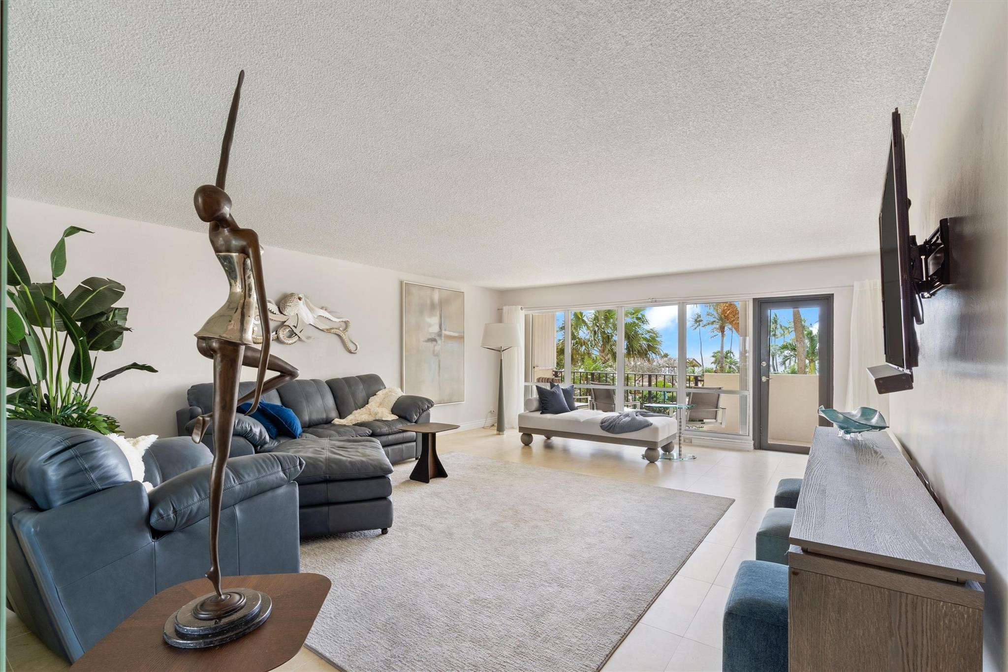 PARTIAL OWNER FINANCING.  Spacious updated 2/2 with oceanfront, pool and tropical garden view.  Semi-private elevator.  Newly remodeled kitchen and bathrooms.   Beautiful amenities include 24 hour security, gym, billiard room, library, 24 hour concierge, beach kitchens with 26 grills and party pavilion, 2 pet parks and an herb garden for cooking. Walk downstairs and your on the sand.  3 pools as well as tennis & pickleball courts.  Located in prestigious Sea Ranch Club. Walk to all shopping as well as the many shops and restaurants just blocks away.  Free transportation around town to residents and their guests as well as parking permits for Lauderdale by the Sea residents. Walk downstairs and your on the private beach. Total resort style living.  Furnishings negotiable. Owner financing available up to $300,000