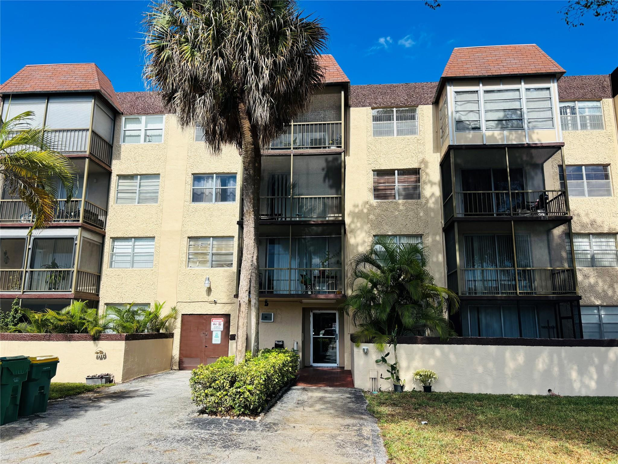 EXCELLENT INVESTMENT OPPORTUNITY! Spacious 1 Bedroom, 1.5 Bath condo located in a secure building with controlled access and intercom entry system. The unit is  currently tenant occupied with long term term, reliable tenants in place. The unit features tile flooring throughout, an open and comfortable layout, enclosed balcony, walk-in closet, lots of storage space, central heat and cold air Located on the second floor, washer & dryer a few steps away, offering added privacy and natural light. Pool and club house, conveniently situated nears schools, shopping and dining.
