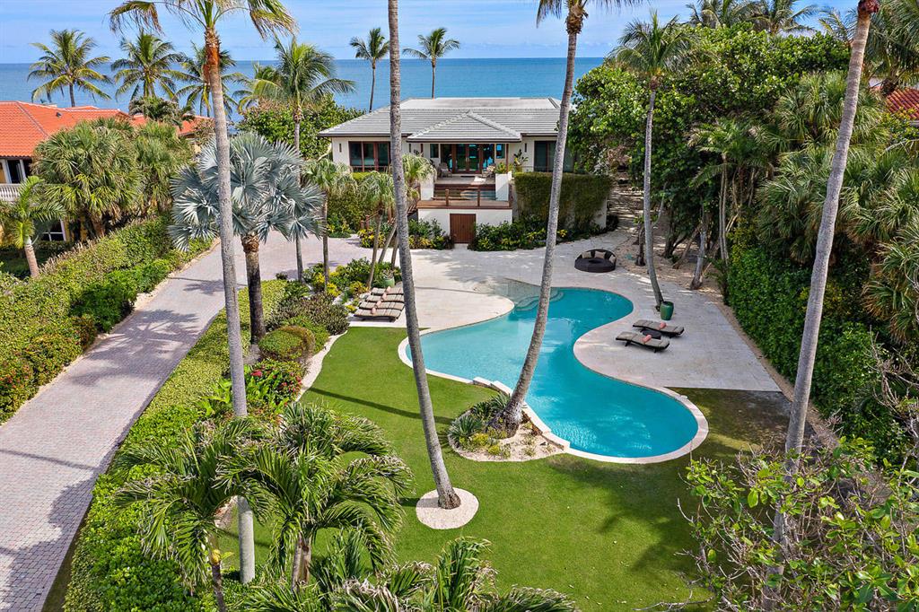 Surrounded by blue water and beaches on both sides, this OCEAN TO INTRACOASTAL property located on the south end of Jupiter Island is the best of both worlds!  Renovated in 2012, the oceanfront South Seas Island contemporary sits directly on the sand and includes prime Intracoastal dockage for boats, jet skis, kayaks and paddle boards and provides unfettered access to the Jupiter Inlet just minutes away.  A tropical paradise for boater's, fishermen and snorkeler's with breathtaking sunrise and sunset views of both the Ocean and Intracoastal. Room to expand up or out with existing space for a future elevator.  Convenient and quick exit off the Island to restaurants, shops, schools and the airport.