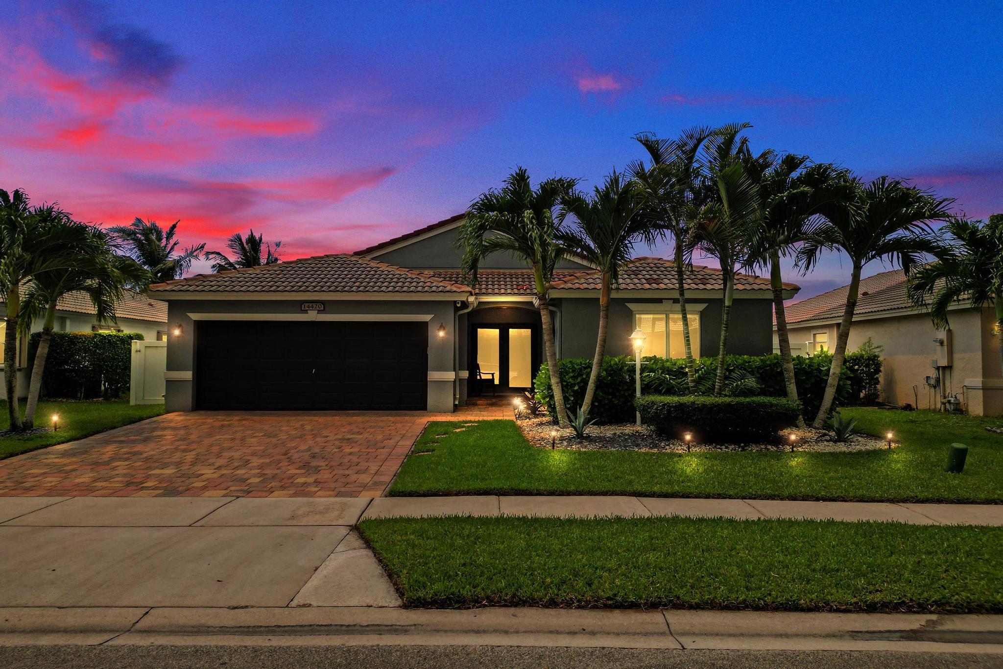 Beautifully positioned on a tranquil lake, this 3-bedroom, 2-bath pool home in the exclusive gated community of Pembroke Falls offers the perfect blend of style, comfort, and resort-style living. Step inside to a bright, open-concept layout filled with natural light, soaring ceilings, and large windows that frame beautiful views of the pool and lake. The gourmet kitchen features stainless steel appliances, quartz countertops, and a seamless flow into the dining and living areas, making it ideal for everyday living and entertaining. The spacious primary suite offers dual walk-in closets and a serene en-suite bathroom, creating a private retreat.  Outdoors, enjoy your own backyard oasis with an oversized sparkling pool and spa, impact windows and sliders. Clubhouse, Tennis, Pickleball.