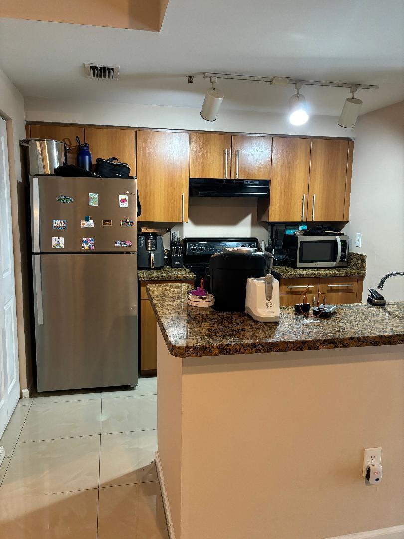 EL-AD POINCIANA CONDO - Residential Lease
