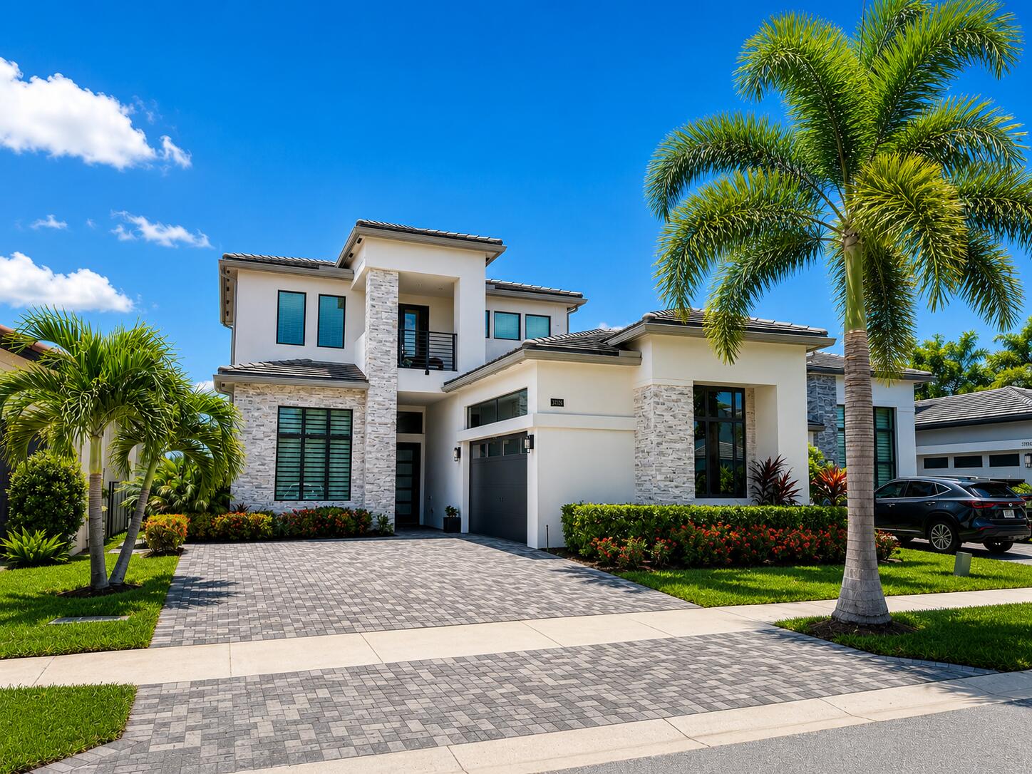 Perfectly positioned on one of the most breathtaking lots in Boca Bridges.This Vienna Grand blends contemporary luxury w/resort-style outdoor living across total 4,337sqft of thoughtfully designed space. Featuring 4 bedrooms,4 bathrooms, a 2-car garage,& an expanded driveway, this home was designed for both elevated entertaining & everyday comfort. From the moment you enter, you are greeted by a wide-open floorplan, soaring natural light, & modern aesthetic curated w/contemporary finishes, lighting, &neutral tones throughout. The heart of the home is built around effortless indoor-outdoor living. A custom bar creates the perfect setting for entertaining, while expansive living spaces flow directly toward the one-of-a-kind lot! All information is subject to errors, omissions or changes. Embrace outside into your own private paradise featuring a sparkling pool, lush turf landscaping, covered patio, and electric shades designed to create the ultimate year-round outdoor experience. Every detail of this backyard was intentionally designed to maximize comfort, privacy, and lifestyle. This is more than a home — it's a statement property offering modern luxury, rare privacy, and a lifestyle that is increasingly difficult to find. Love where you live at 17370 Santaluce Mnr.
