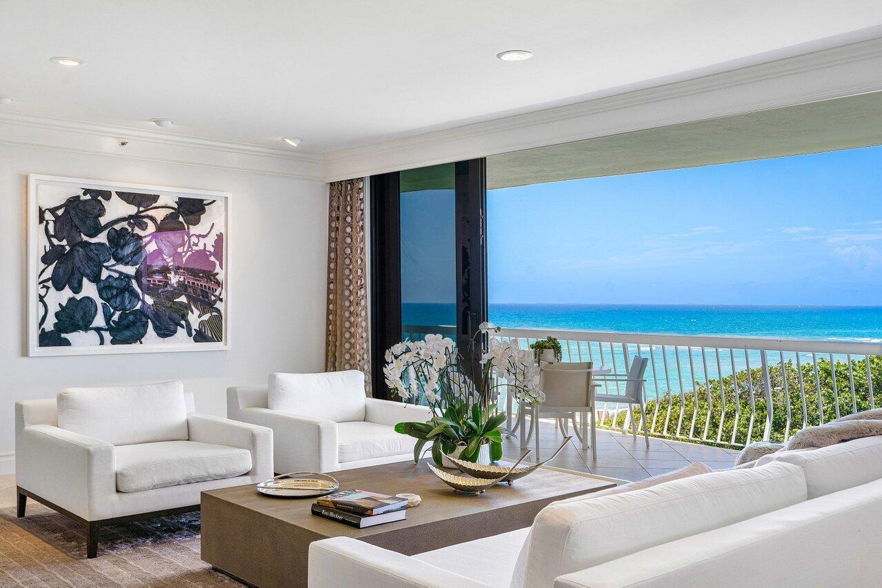 An extraordinary offering with gorgeous unobstructed Ocean Views from every room! Stunning 2,400+/- sq ft 2 bedroom, 2 en-suite baths + powder room with separate office and media room at the sought-after 2100 Sloans Curve. Bathed in sunny south facing light boasting volume ceiling heights, pocketed hurricane impact doors, motorized solar shades, marble floors and baths, abundant storage and an oversized balcony to enjoy from sunrise to sunset. Newly designed 2100 Sloans Curve is a luxury full service building offering resort-like amenities including 24/7 manned gatehouse, concierge, heated pool & spa, fitness center, har-tru tennis facility, 2 car garage and direct beach access. Poolside cabana offered separately. Live the ultimate Palm Beach lifestyle!