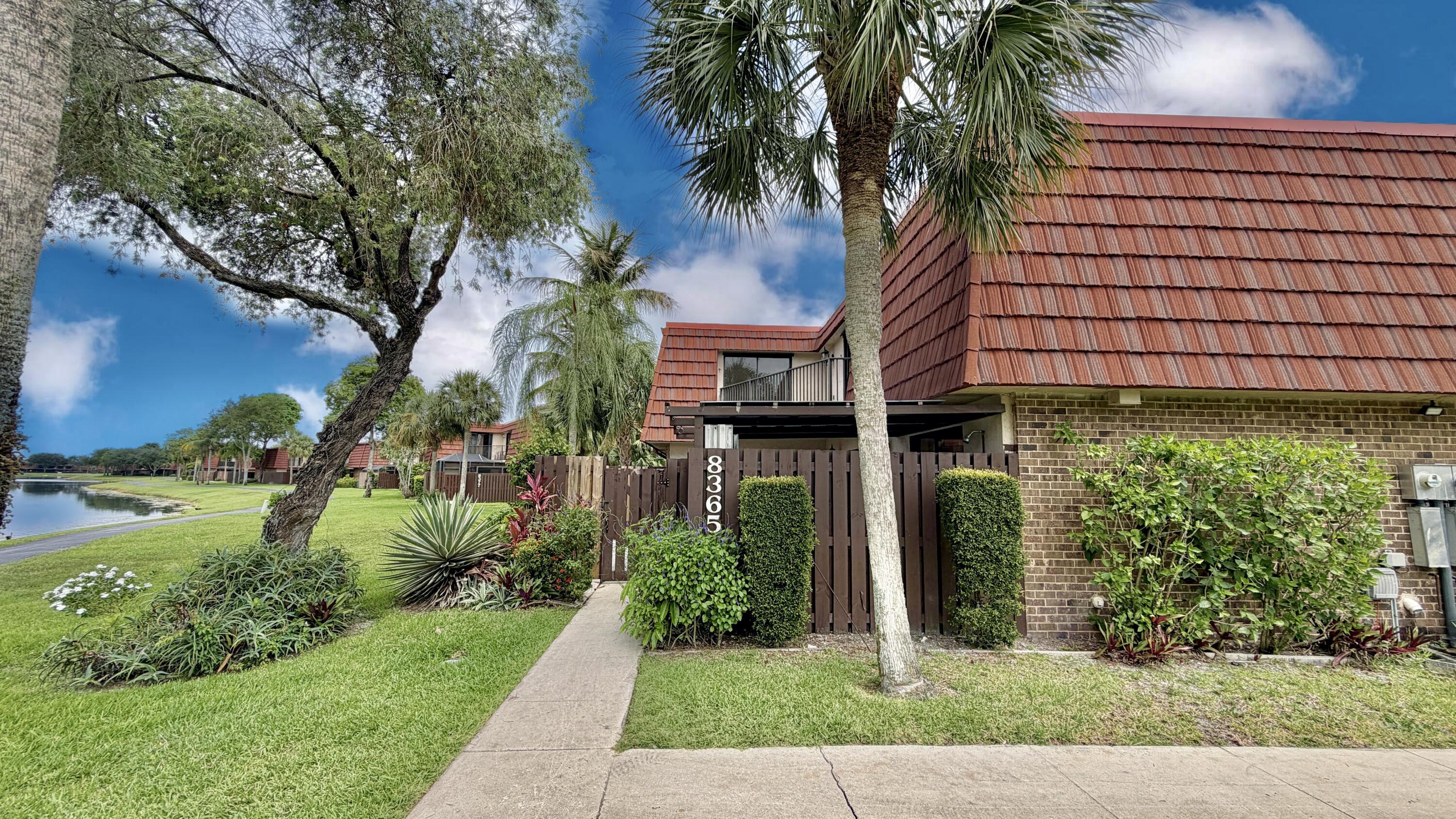 Featuring 3 bedrooms, 2.5 bathrooms, and 1,589 SqFt of living space, this nicely updated home offers a bright open floor plan with abundant natural light, a renovated interior, and stainless steel appliances. The first floor includes one bedroom, while the primary bathroom features a standing shower and separate tub. Enjoy peaceful lake views from the private patio and balcony, perfect for relaxing or entertaining. Brand-new A/C installed June 2025 and roof replaced in 2024. Assigned parking space #147. Monthly HOA is $388. Special assessment of $150/month with an approximate remaining balance of $12,285 to be assumed by buyer. HOA does not allow rentals during the first year of ownership. Conveniently located close to shopping, dining, and major conveniences. Vacant