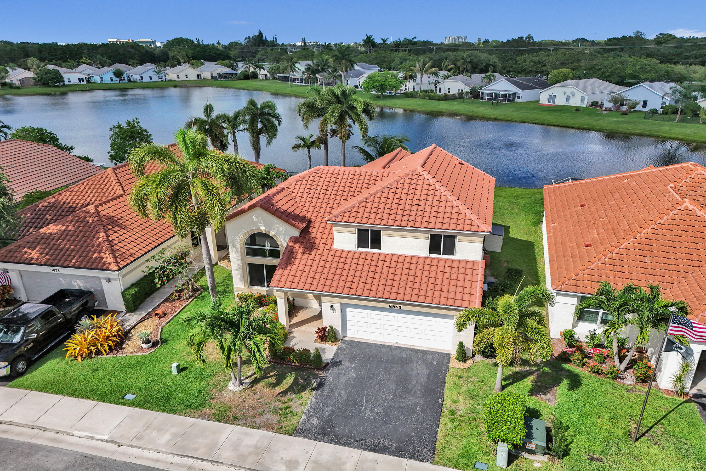 Completely remodeled 4BD/2.5BA waterfront home in the highly desirable Forest Ridge community of Davie. This move-in ready residence blends modern luxury with comfortable living, featuring soaring vaulted ceilings, an open light-filled layout, and a desirable first-floor primary suite. The designer kitchen showcases quartz countertops, updated cabinetry, and contemporary finishes throughout. Spacious living areas flow seamlessly to the outdoor space, creating the perfect setting for relaxing or entertaining while enjoying tranquil water views. Major upgrades include a new roof (2023), impact windows and doors (2024) and copper piping. Located in one of Davie's most sought-after neighborhoods with top-rated schools, parks, and amenities.