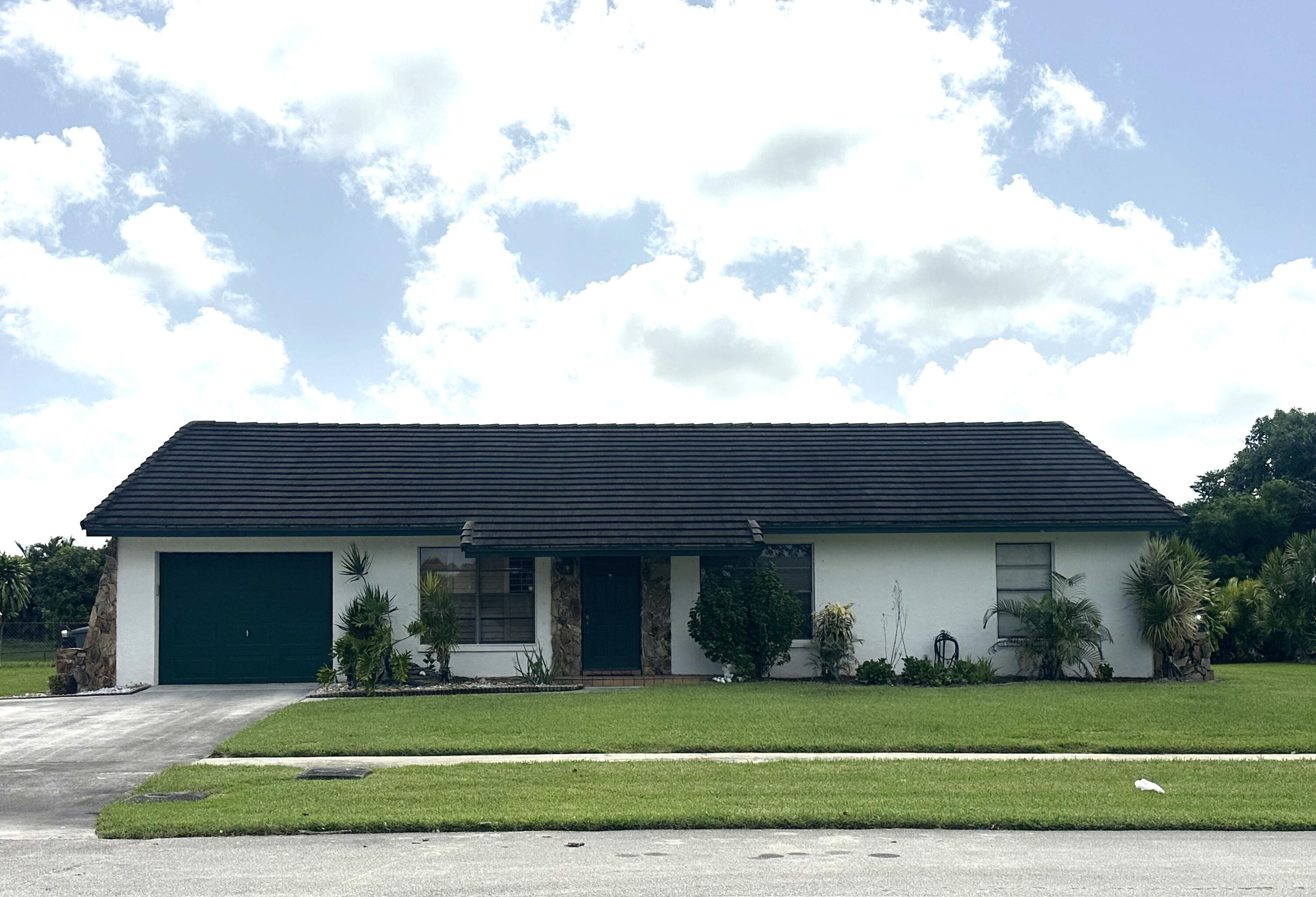 Welcome to this charming single-story home situated on 1/4 acre in Le Chalet, Boynton Beach, offering 1,410 square feet of comfortable living space. This three-bedroom, two-bathroom home features a one-car garage for convenient parking and storage. Set on a waterfront property, this residence provides a distinctive setting within the established Le Chalet  community. The thoughtful layout of this single-family home accommodates modern living while the waterfront location adds a special appeal. Discover the possibilities this home presents in one of Boynton Beach's established residential communities.