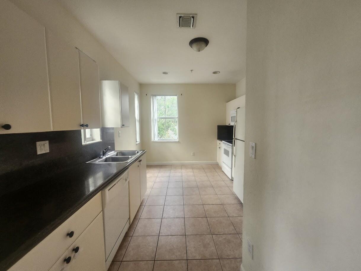 SHOMA TOWNHOMES AT ROYAL PALM BEACH CONDO - Residential Lease