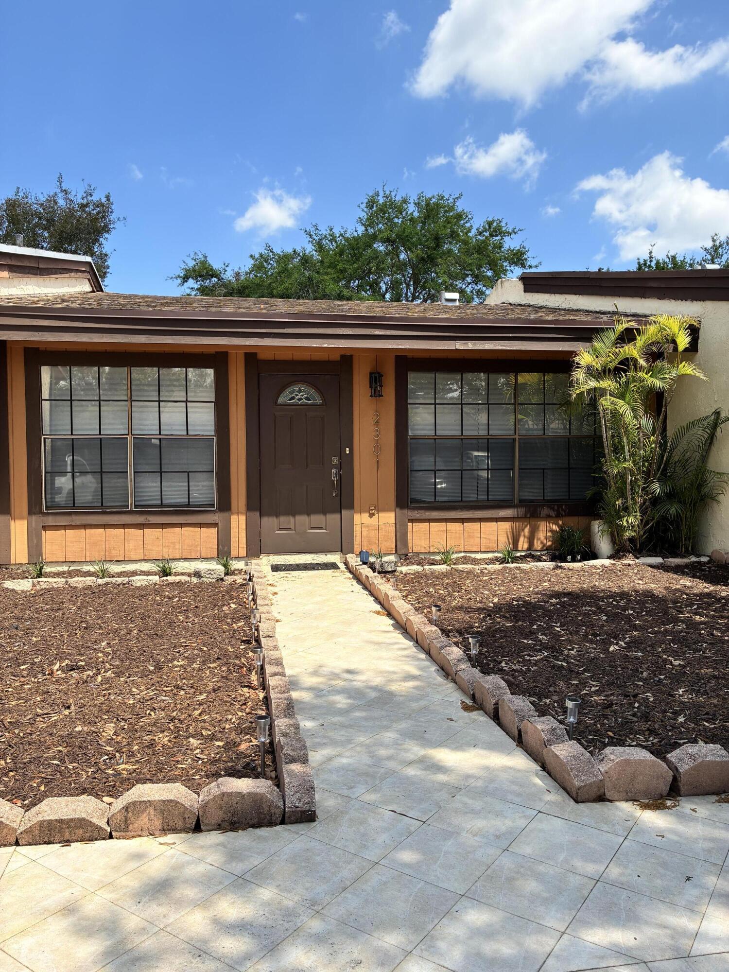 Welcome to this nicely maintained home 2 bedroom 2 bath home in the heart of Pembroke Pines! Featuring fresh paint, new sod, and thoughtful updates throughout, this move-in ready property offers comfort and convenience. Enjoy a private fenced backyard, perfect for relaxing or entertaining. Located in a well-kept community with a low HOA and FHA approved!  Take advantage of the scenic lake with walking trails and benches just steps away, or enjoy the nearby playground. Situated in an A-rated school district and just minutes from shopping, dining, and Pembroke Lakes Mall, this home offers the perfect blend of lifestyle and location. A true blank canvas ready for your personal touch!