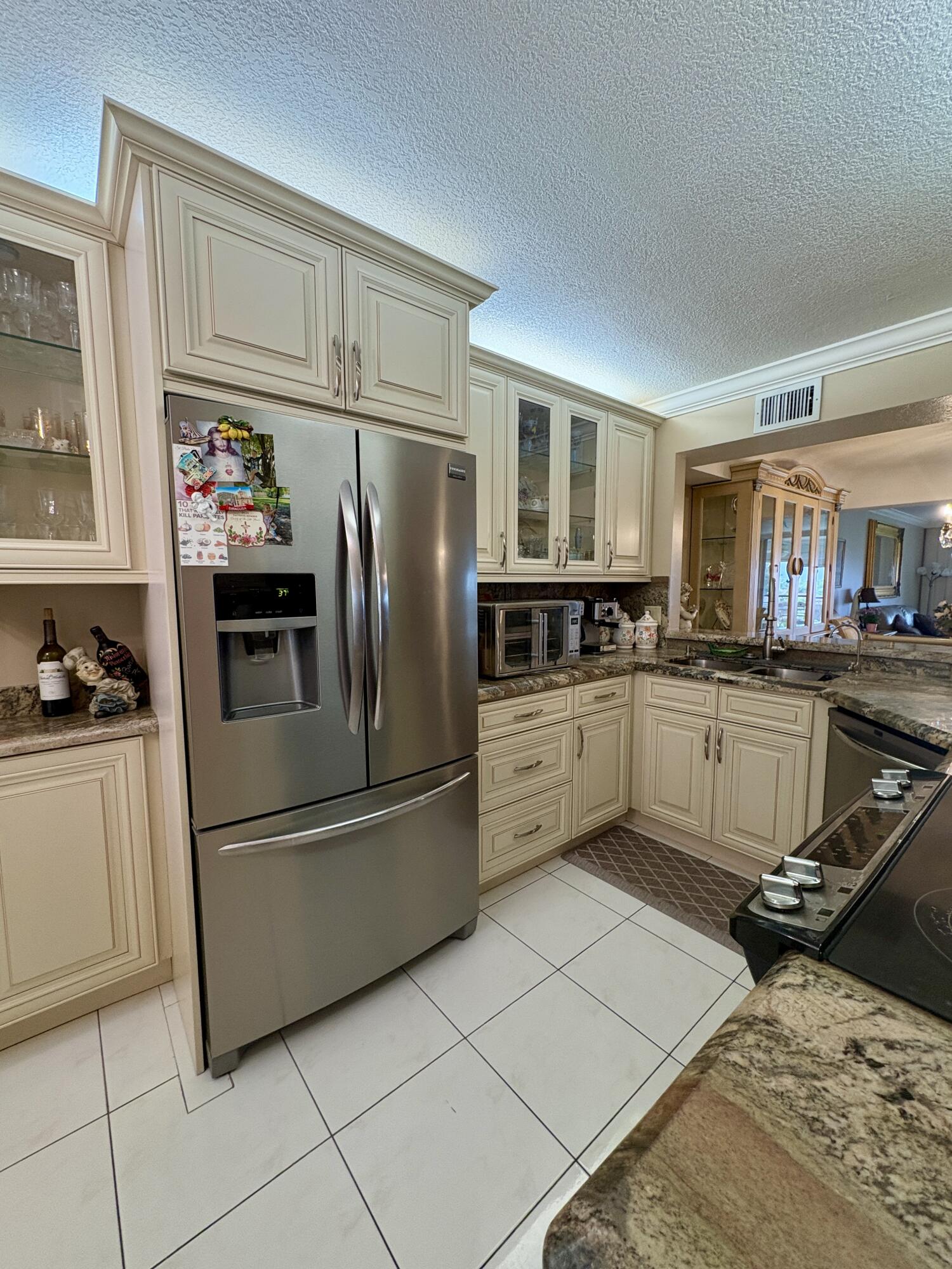 Welcome to this beautifully updated 2BR/2BA condo in the highly sought-after 55+ community of Barwood! This spacious 4th-floor unit offers stunning golf course views and an oversized screened patio perfect for outdoor relaxation. The interior features a traditional design with crown molding, knockdown ceilings, ceramic tile flooring throughout, and marble finishes in the bathrooms. The oversized master suite includes a walk-in closet and redone bathroom.

The kitchen boasts a cozy breakfast nook, updated appliances, classic cabinetry, and window panel accents. Enjoy the convenience of an in-unit washer and dryer, and hurricane-impact windows in the process of being installed. Community features include a clubhouse with kitchen, resort-style pool, tennis courts, gym, elevators, and security cameras. HOA fee is $550/month and includes cable, internet, water, exterior maintenance, and all amenities. Roof and building have been recently redone.

Tucked away in a small, quiet community with only six buildings, this property offers privacy and a close-knit feeljust minutes from shopping, dining, and everything Boca Raton has to offer."