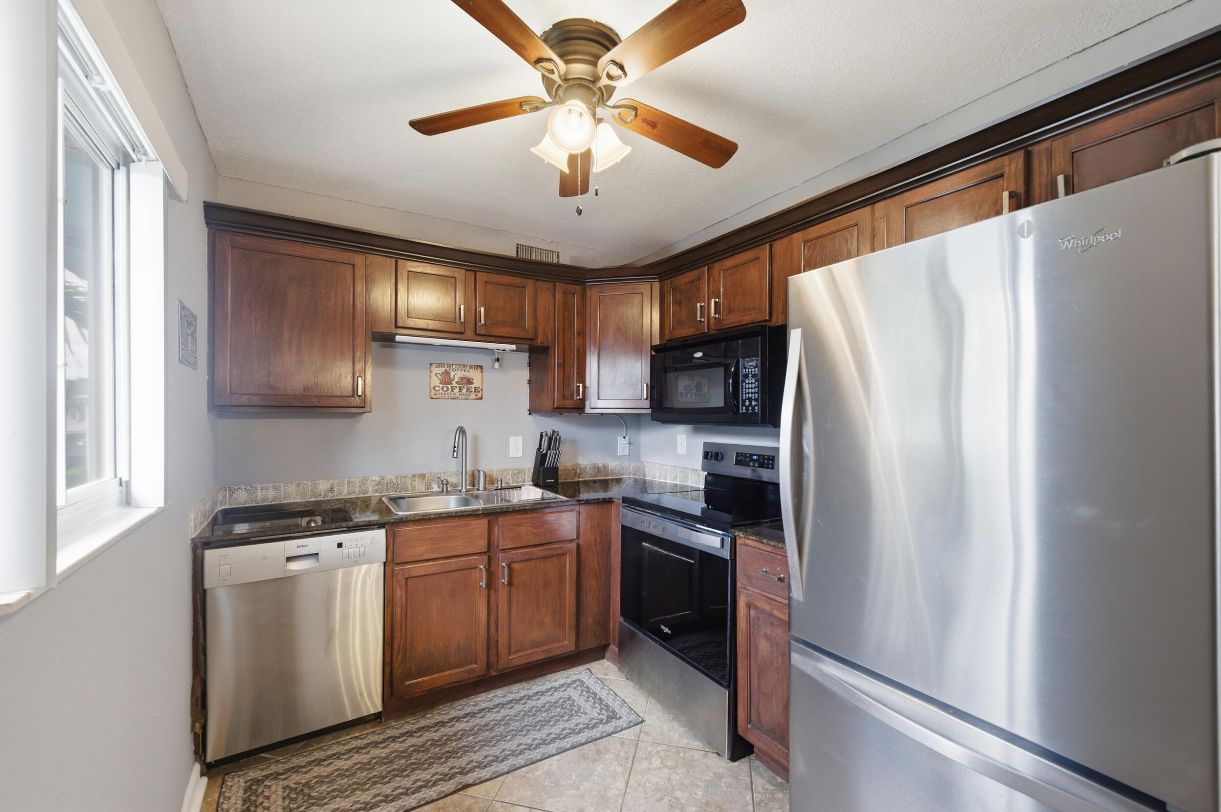 Enjoy Relaxing Water Views in Kings Point! Beautifully updated and completely furnished condo featuring beautiful water views, tile flooring throughout, stainless steel appliances, quartz countertops, and tasteful finishes throughout. Move right in and enjoy all the comforts of South Florida living from your private screened patio.Located in the highly desirable Kings Point, this active 55+ gated community offers an exceptional resort-style lifestyle with an impressive array of amenities. Residents enjoy access to three clubhouses, indoor and outdoor pools, fitness centers, tennis courts, pickleball courts, shuffleboard, bocce ball, billiards, card rooms, arts and crafts studios, library, salon, café, theater, and countless social clubs, golf and more.