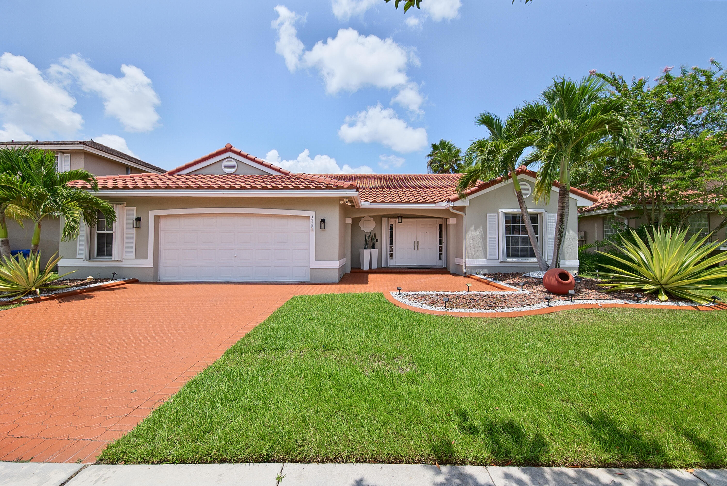 Beautifully updated waterfront home in a highly sought-after gated community! From the moment you step inside this stunning 3-bedroom, 2-bathroom residence, you'll appreciate the soaring vaulted ceilings, bright open floor plan, and modern finishes throughout. Enjoy breathtaking water views from the spacious living areas and relax on the screened patio overlooking your peaceful backyard—perfect for entertaining or unwinding year-round. Additional highlights include a 2-car garage, a new roof (2022), and a new A/C (2025). This move-in-ready home offers the perfect combination of luxury, comfort, and carefree waterfront living.
