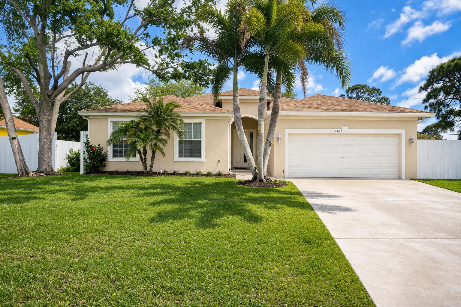 **Beautiful Home with 3 Bedrooms, 2 Bathrooms, and a 2-Car Garage!** This stunning property features an open layout with high ceilings and spacious living areas. The kitchen boasts ample cabinetry and stainless steel appliances. The large primary suite includes dual sinks, a tub, and a shower. Enjoy a fully fenced yard with a covered outdoor lounge, perfect for entertaining. Soft water and alkaline water filtration in the kitchen are included. This home is move-in ready and conveniently located!