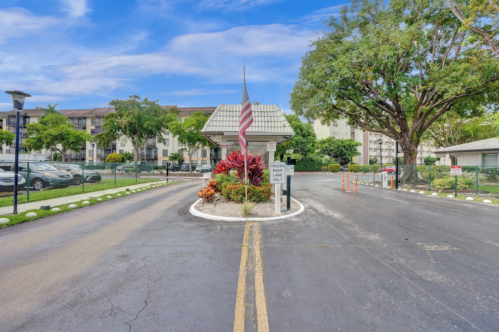 Experience effortless South Florida living in this fully remodeled condo with traquil golf course views! This move-in-ready residence showcases large-format white porcelain tile flooring, a sleek contemporary kitchen with white cabinetry, quartz countertops, custom tile backsplash, premium stainless steel LG appliances & a built-in wine fridge. Thoughtfully upgraded with designer lighting, new interior doors & hardware & in-unit front-load washer & dryer, every detail has been carefully curated. Spacious walk-in closets offer abundant storage, while the oversized private balcony provides the perfect setting to relax & take in the peaceful golf course scenery. Enjoy an active, resort-style lifestyle with amenities including a clubhouse, heated pool, pickleball & tennis. 55+ community.