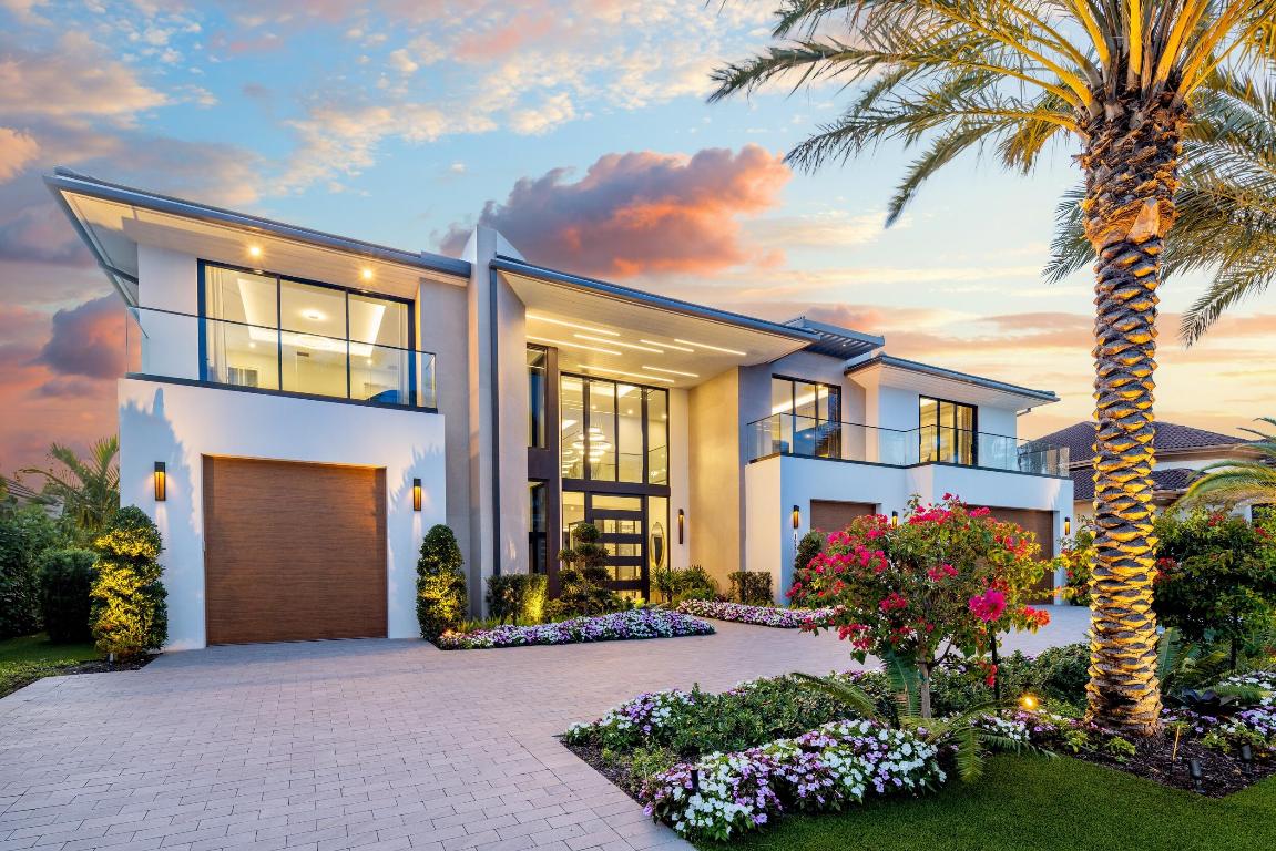 1955 Thatch Palm in Royal Palm Yacht & Country Club is a striking new architectural masterpiece — a sophisticated fusion of contemporary European design and the tropical elegance of the South Florida lifestyle, all set along the prestigious golf course in Boca Raton's most coveted enclave. Developed by Albanese & Sons, with architecture by BE Design and interiors masterfully curated by Zelman Style Interiors, this estate is a bold statement of refined sophistication and resort-style grandeur. This luxurious contemporary residence embodies the pinnacle of quality, elegance, and craftsmanship. 1955 Thatch Palm captivates with its sleek lines, refined architectural language, and meticulous attention to detail. Throughout the home, rich, high-end materials are artfully applied from polished contemporary elements to the layered textures of bespoke finishes creating an atmosphere that is at once stylish, functional, and timeless. 

Upon arrival, a soaring two-story foyer with exquisite tile floors and granite accents sets an unforgettable tone, leading into a dramatic great room that perfectly frames the shimmering infinity-edge pool and spa. At the heart of the home, the chef's gourmet kitchen boasts top-of-the-line appliances, a spacious Butler's Pantry, and flows seamlessly into a formal dining room adorned with custom built-ins. The main level also features a private home office, expansive family room, chic club room with built-in bar nook, and an indulgent game room with a full bar an entertainment center.  A custom wine cellar with a striking two-way fireplace adds a captivating architectural element, while a guest suite, cabana bath, and dual mechanical rooms complete the ground floor.

Upstairs, the primary suite is a sanctuary unto itself, offering separate his-and-hers bathrooms, expansive walk-in closets, a morning bar, and a private balcony overlooking panoramic golf course vistas. Four additional en-suite bedrooms include two VIP suites; bedroom three opens to a peaceful terrace, and bedroom four enjoys a private terrace overlooking the resort-style pool. A generous loft-style playroom, second laundry room, and additional mechanical room complete the upper level.

Step outside into an entertainer's paradise: a heated infinity-edge pool and spa, covered terrace with a summer kitchen and built-in grill, fire pit, and outdoor entertainment center all designed to deliver the ultimate backyard experience. A dedicated cabana bath with storage and a whole-home natural gas generator ensure year-round comfort and convenience.

Situated within the exclusive Royal Palm Yacht & Country Club, 1955 Thatch offers unrivaled access to world-class amenities. Just minutes from The Boca Raton Resort & Club, Mizner Park, fine dining, luxury shopping, and pristine beaches. Perfectly situated at the heart of Boca Raton's premier lifestyle. With 24-hour security, proximity to Boca Aviation, and easy access to both Fort Lauderdale-Hollywood International and Palm Beach International Airports, this is luxury living without compromise.

Experience the rare opportunity to own a newly constructed, fully furnished architectural jewel in one of Florida's most prestigious communities - at an extraordinary value. A masterpiece of design. A sanctuary of lifestyle. A home like no other. Where nature and luxury meet in perfect harmony.