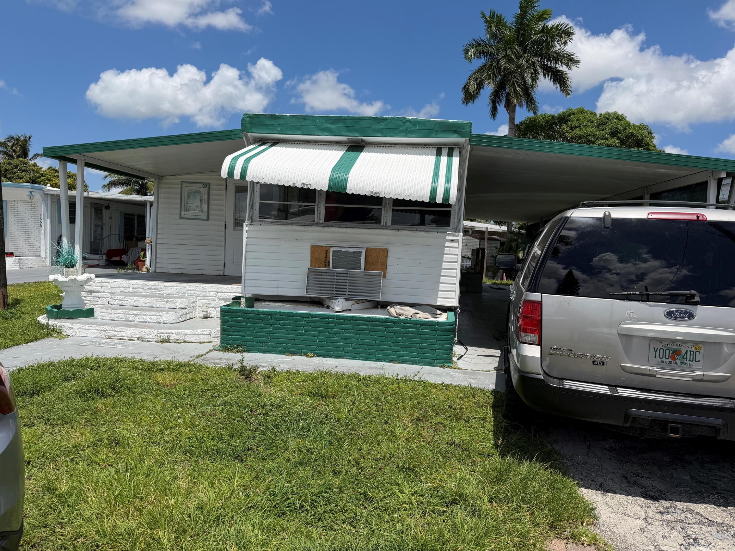 Nice  2/1 with carport - shed - on Canal - -tile floors through out - -assoc. states it is HOPA verified - priced right for quick sale - -one of the lowest priced in Park City...