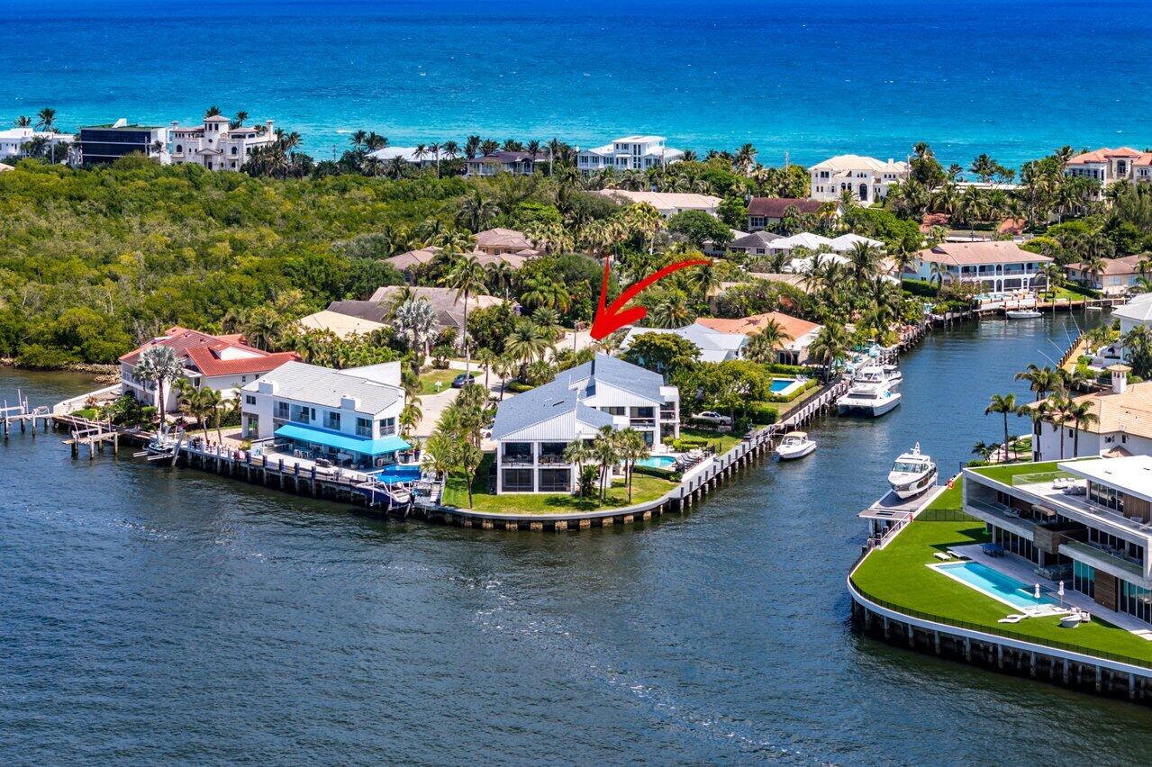 Your Waterfront Dream is finally attainable... This spacious 3-bedroom, 2-bathroom condo, with 2,059 sqft. of open-concept living space, rests privately in a cul-de-sac, directly on the wide intracoastal. Whether you're relaxing on one of your (3) oversized terraces, mesmerized by the parade of  boats on the intracoastal or entertaining guests with your daily sunset views, this home provides coastal living at it's finest. Private and secluded, amenities include direct access to a dock, heated pool and walking distance to your private beach.  Don't miss this unique opportunity to own your own slice of Highland Beach's intracoastal frontage. Schedule your appointment today! Seeing is believing!   (Interior photos to follow...) The interior boasts a luxurious newly renovated kitchen and baths, including porcelain tiled floors, skylights, and recessed lighting, and brand new impact windows and doors.  The thoughtfully designed kitchen features 2 oversized islands with quartzite tops, and brand new stainless steel appliances. Call me today to set up an appointment to see the incredibly unique value of this Highland Beach property.