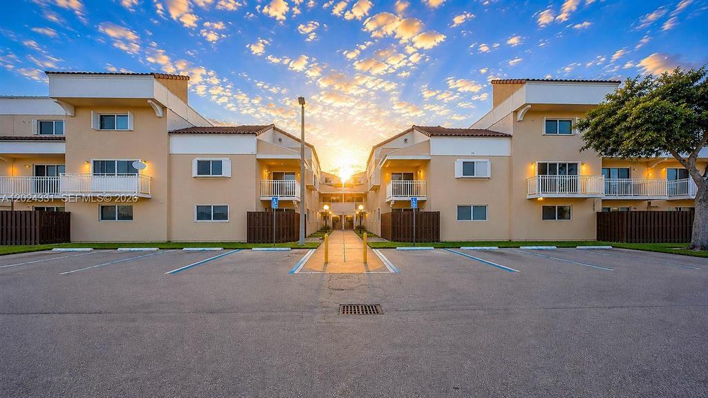 Beautiful 2 bedroom, 2.5 bath townhouse in The Seasons Villas & Townhouses of Kendall. This bright corner features 1,060 sq. ft. of living space, ceramic tile floors, an open dining/living area, and a private balcony with garden views. enjoy a well-equipped kitchen with modern appliances, central A/C, and assigned parking. Community amenities include a pool, playground, and clubhouse. Very well kept and clean community. Recently installed roof and new exterior paint. Maintenance covers water, sewer, trash, roof and exterior. Conveniently located near major highways, shopping and schools. Pet-friendly and move-in ready!